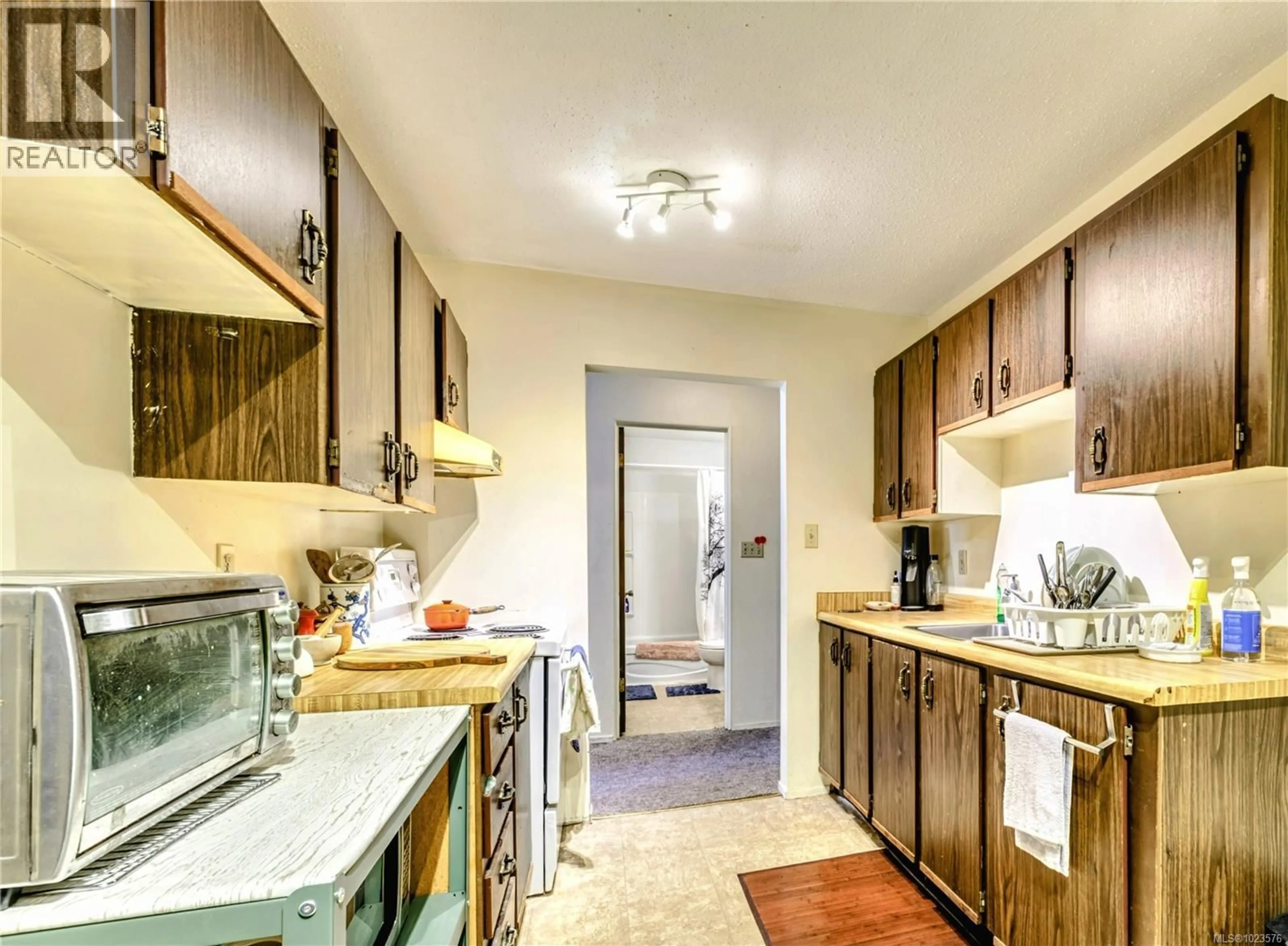 Kitchen with laundary machines, unknown for 403 - 7450 RUPERT STREET, Port Hardy British Columbia V0N2P0