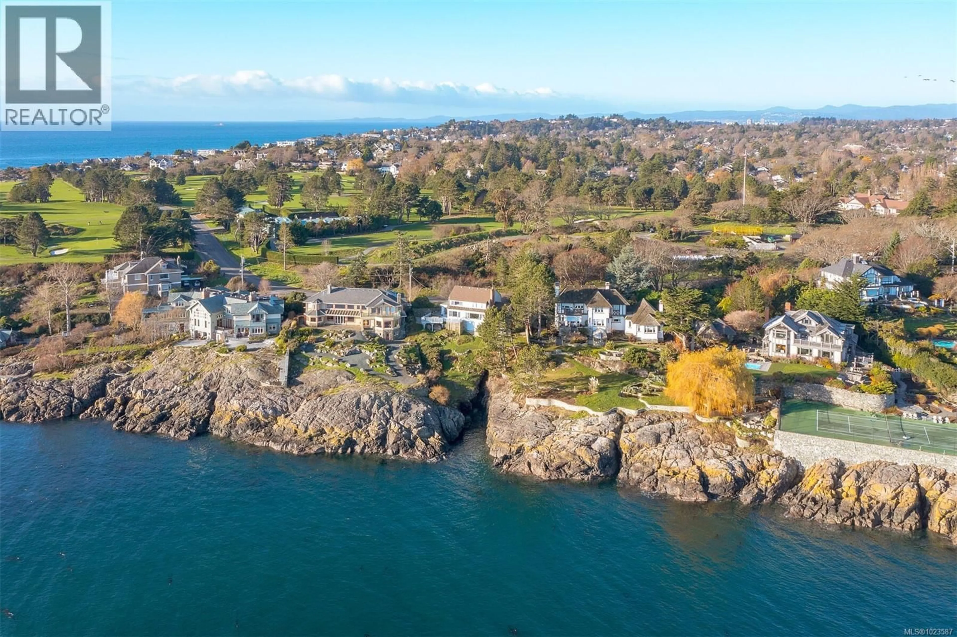 A pic from outside/outdoor area/front of a property/back of a property/a pic from drone, water/lake/river/ocean view for 987 BEACH DRIVE, Oak Bay British Columbia V8S2N2