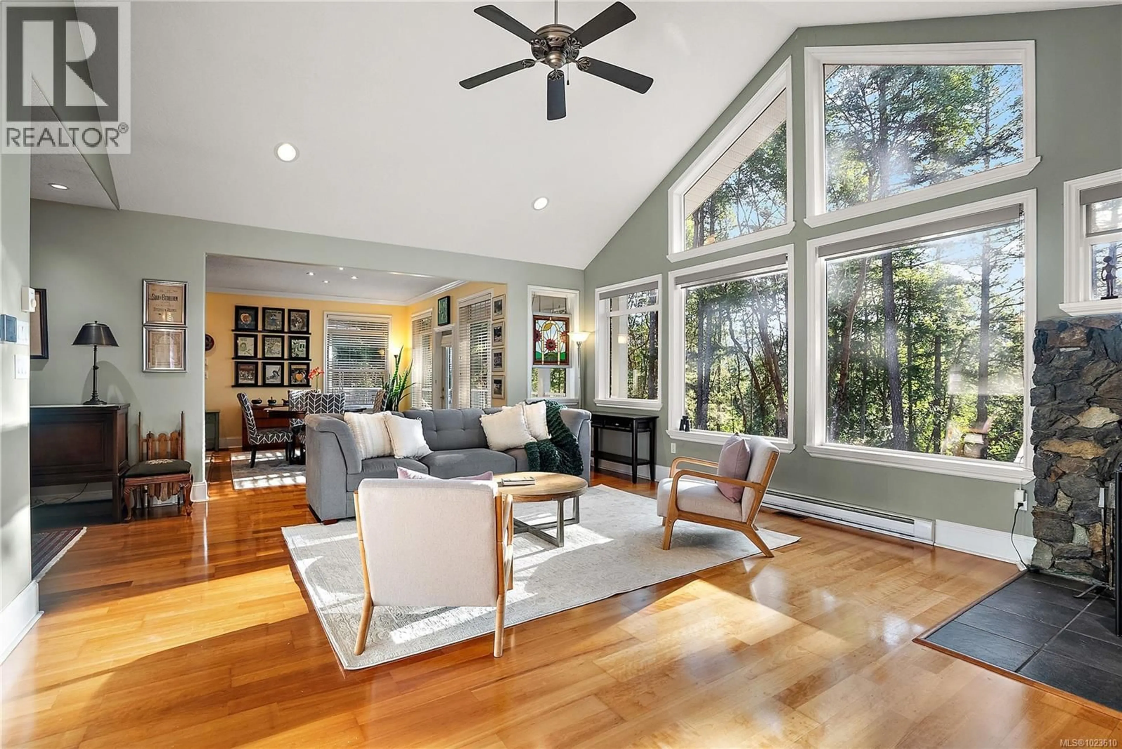 Living room with furniture, wood/laminate floor for 1126 ASPEN ROAD, Malahat British Columbia V0R2L0