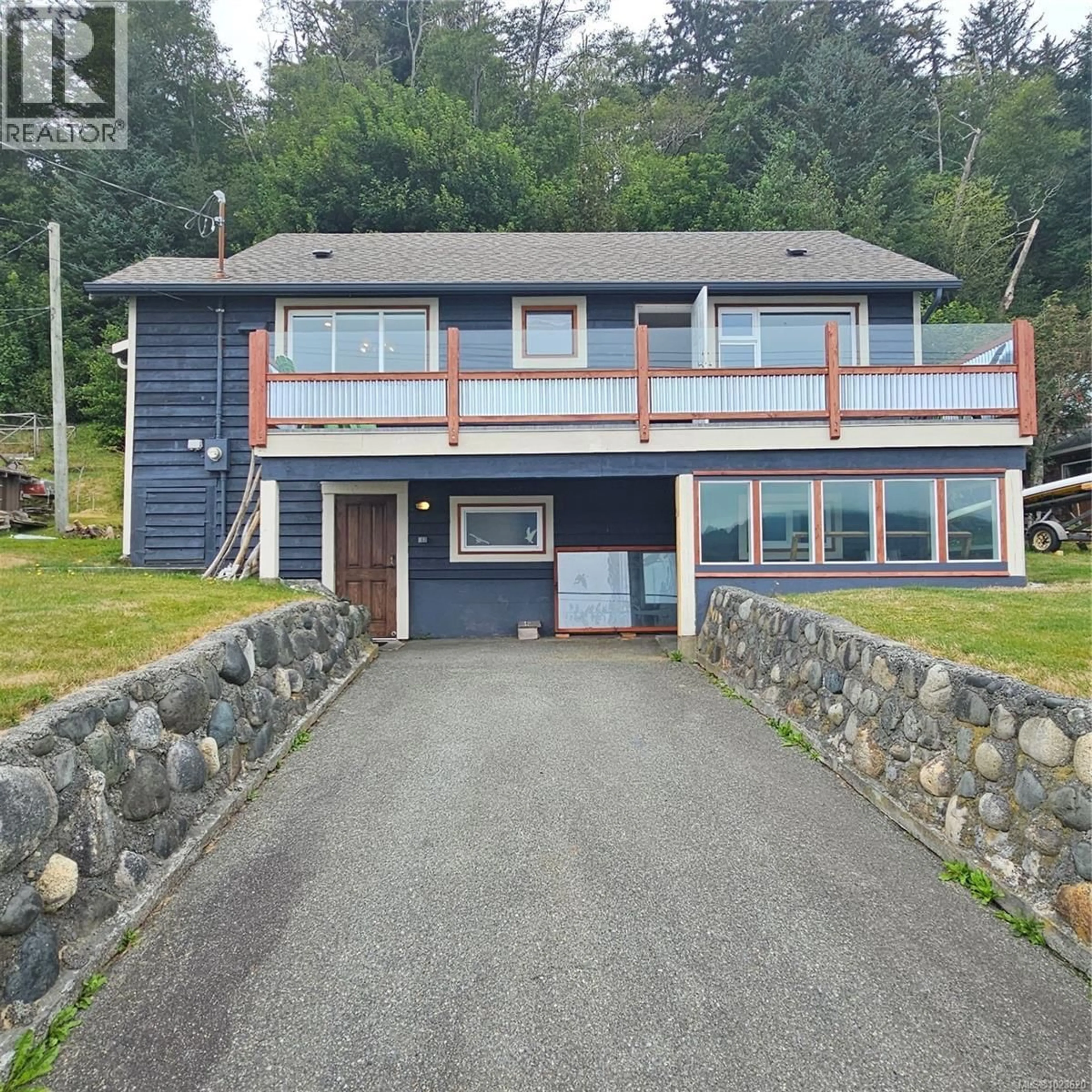 A pic from outside/outdoor area/front of a property/back of a property/a pic from drone, unknown for 497 FIR STREET, Alert Bay British Columbia V0N1A0
