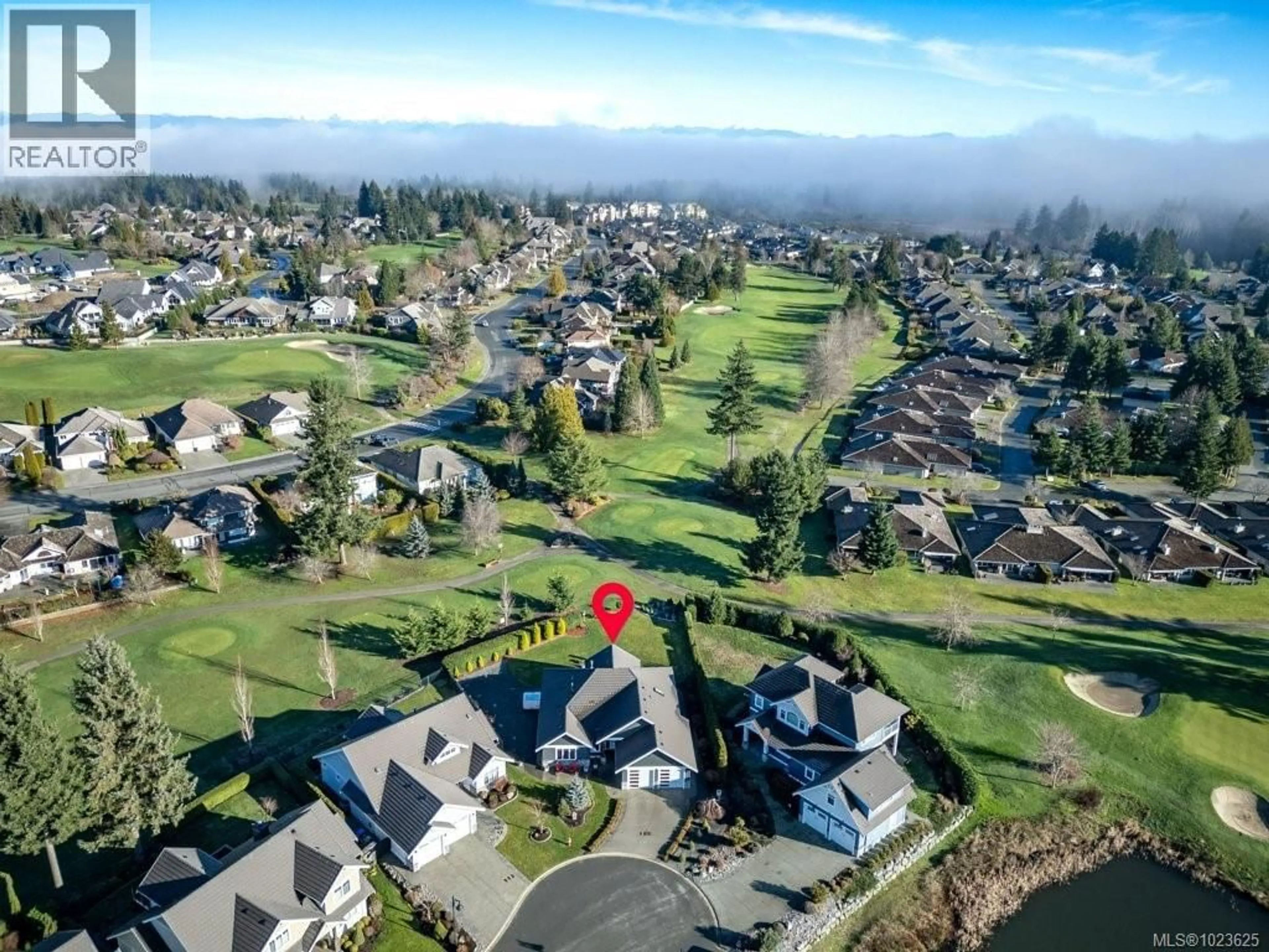A pic from outside/outdoor area/front of a property/back of a property/a pic from drone, mountain view for 229 - 1290 CROWN ISLE DRIVE, Courtenay British Columbia V9N0B8