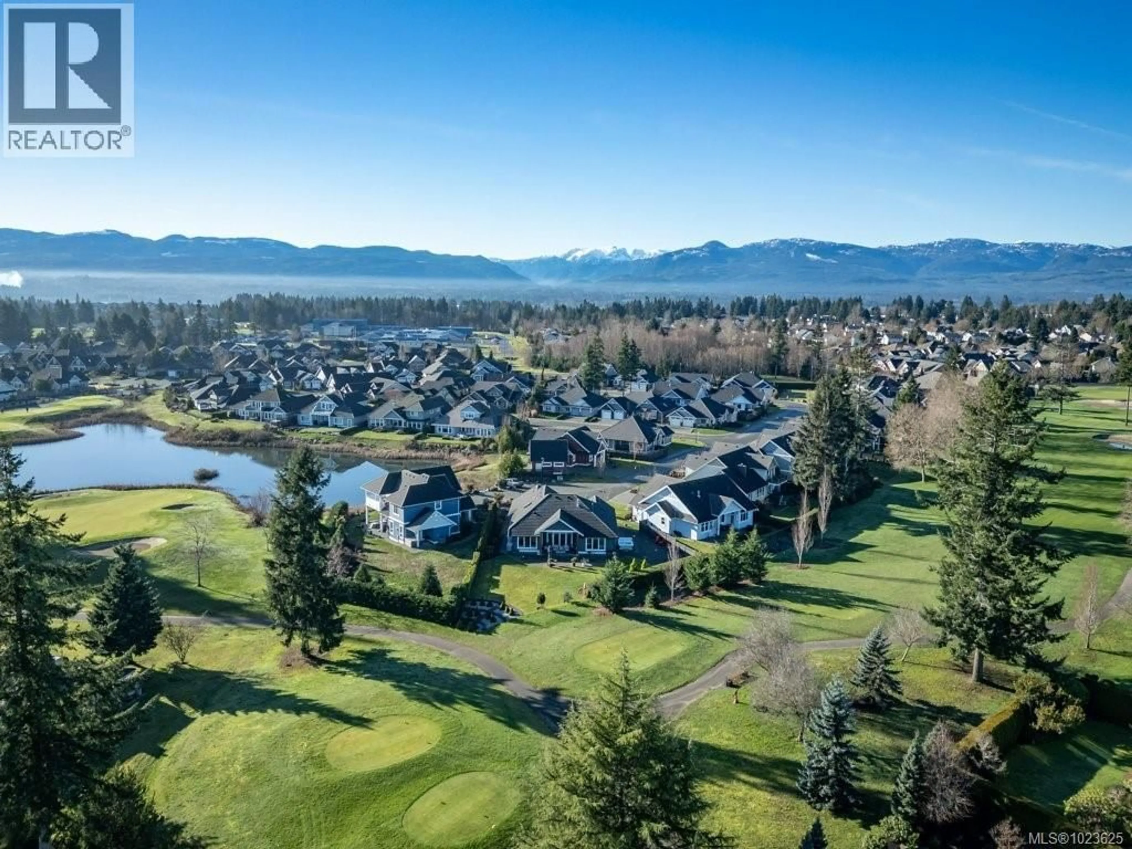 A pic from outside/outdoor area/front of a property/back of a property/a pic from drone, mountain view for 229 - 1290 CROWN ISLE DRIVE, Courtenay British Columbia V9N0B8