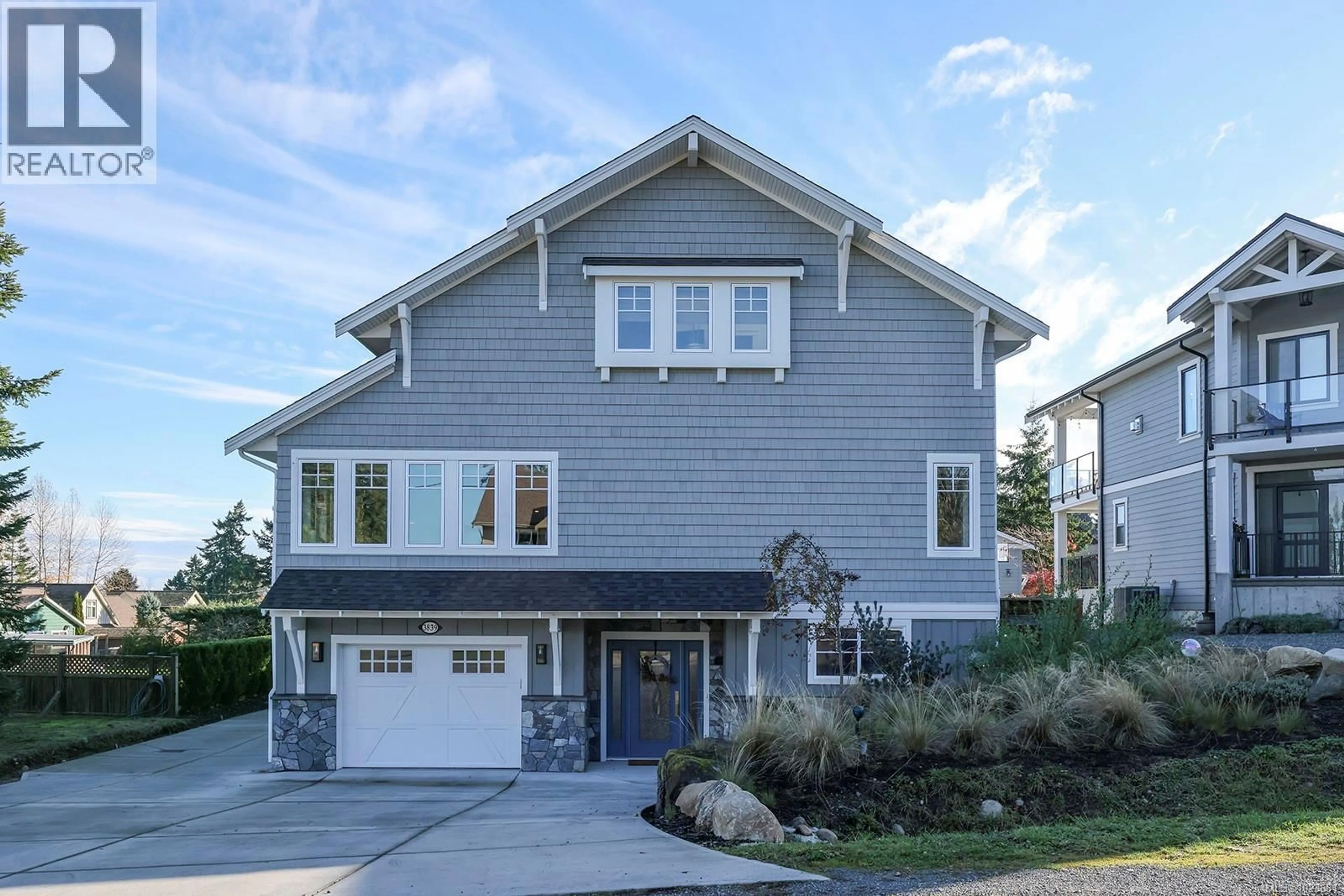 Home with vinyl exterior material, street for 3839/3841 ROSS AVENUE, Royston British Columbia V0R2V0