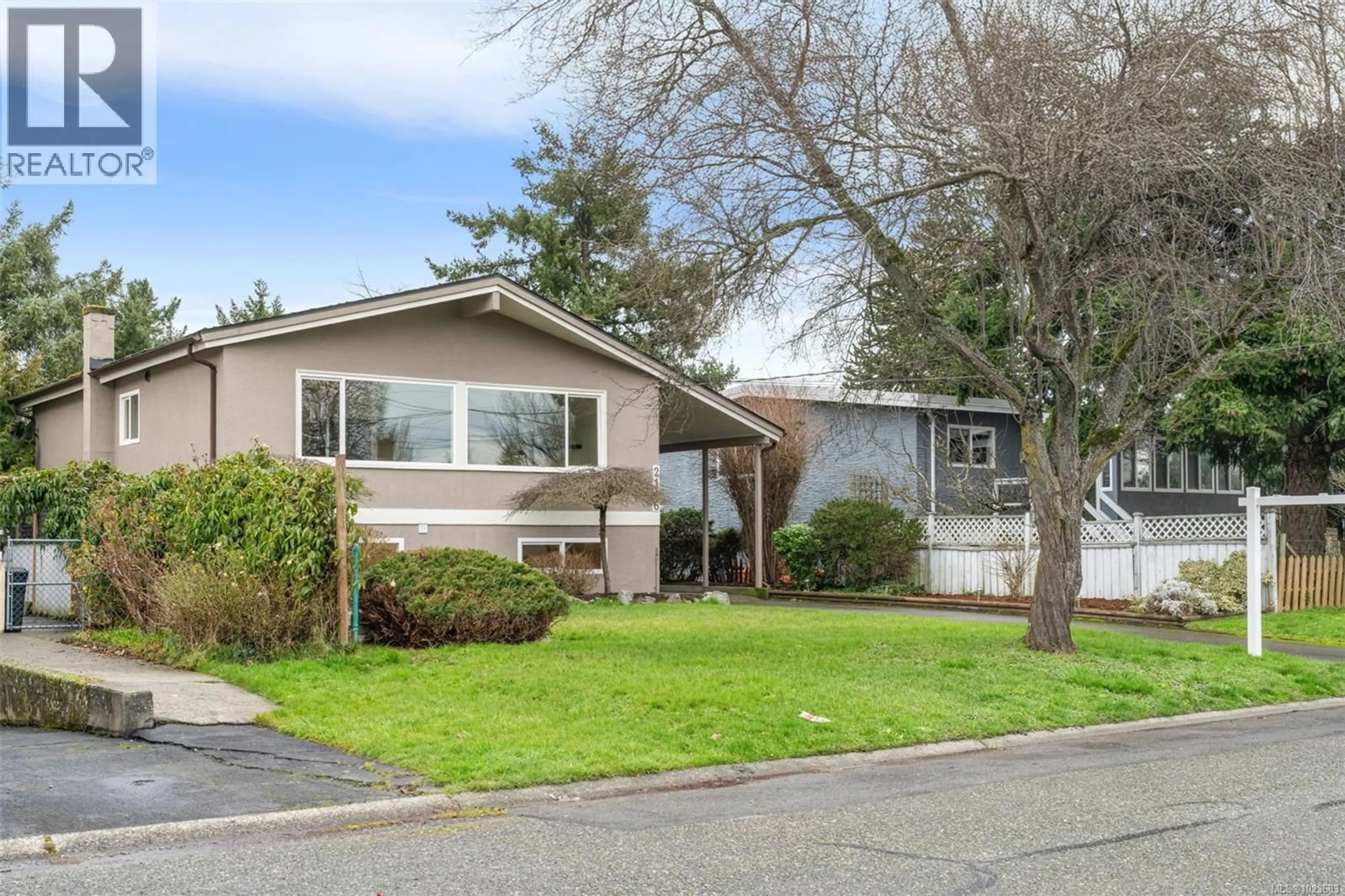 Home with vinyl exterior material, street for 2146 BRADFORD AVENUE, Sidney British Columbia V8L2C5