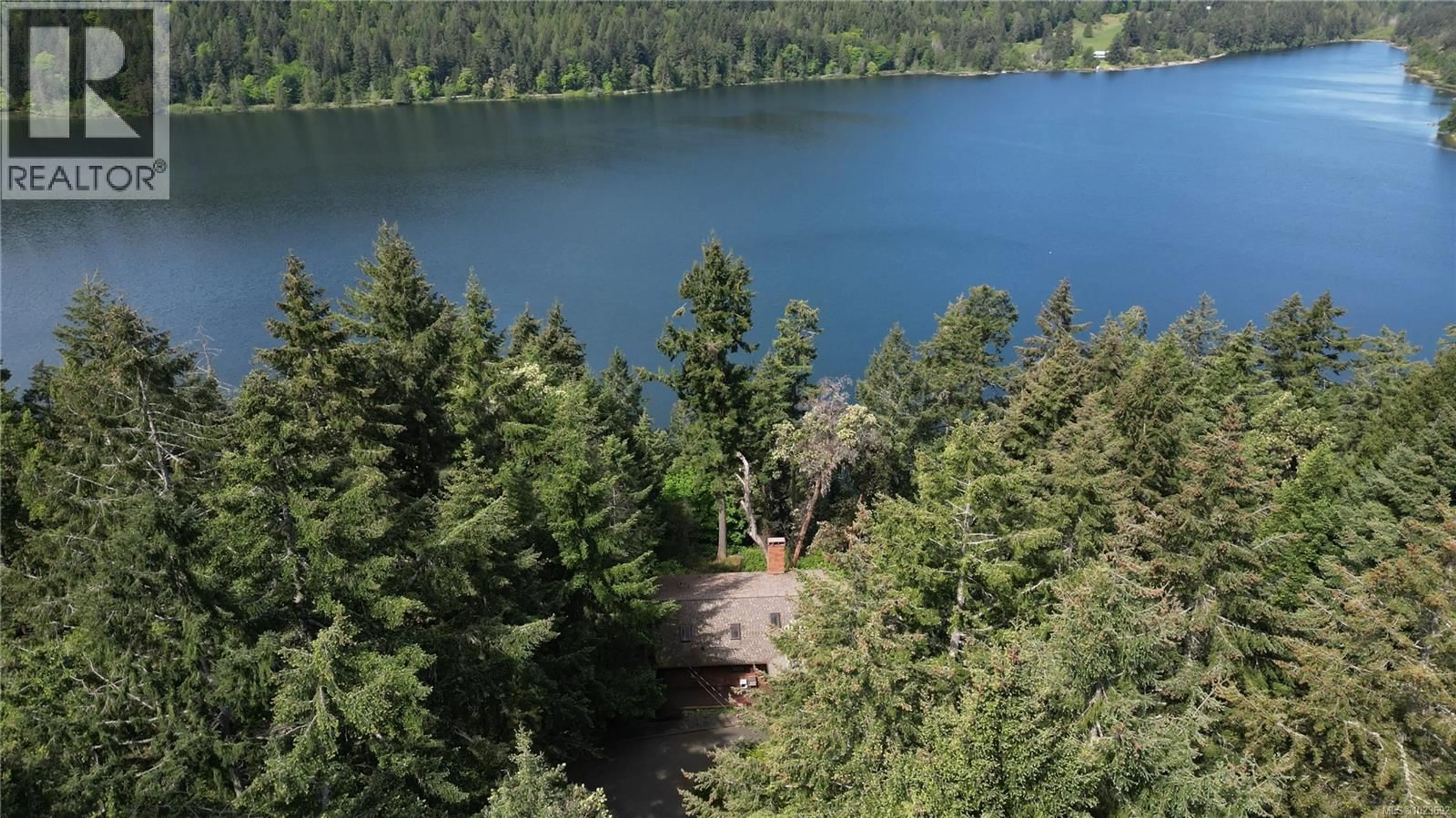 A pic from outside/outdoor area/front of a property/back of a property/a pic from drone, forest/trees view for 250 SOUTH BANK DRIVE, Salt Spring British Columbia V8K1M7