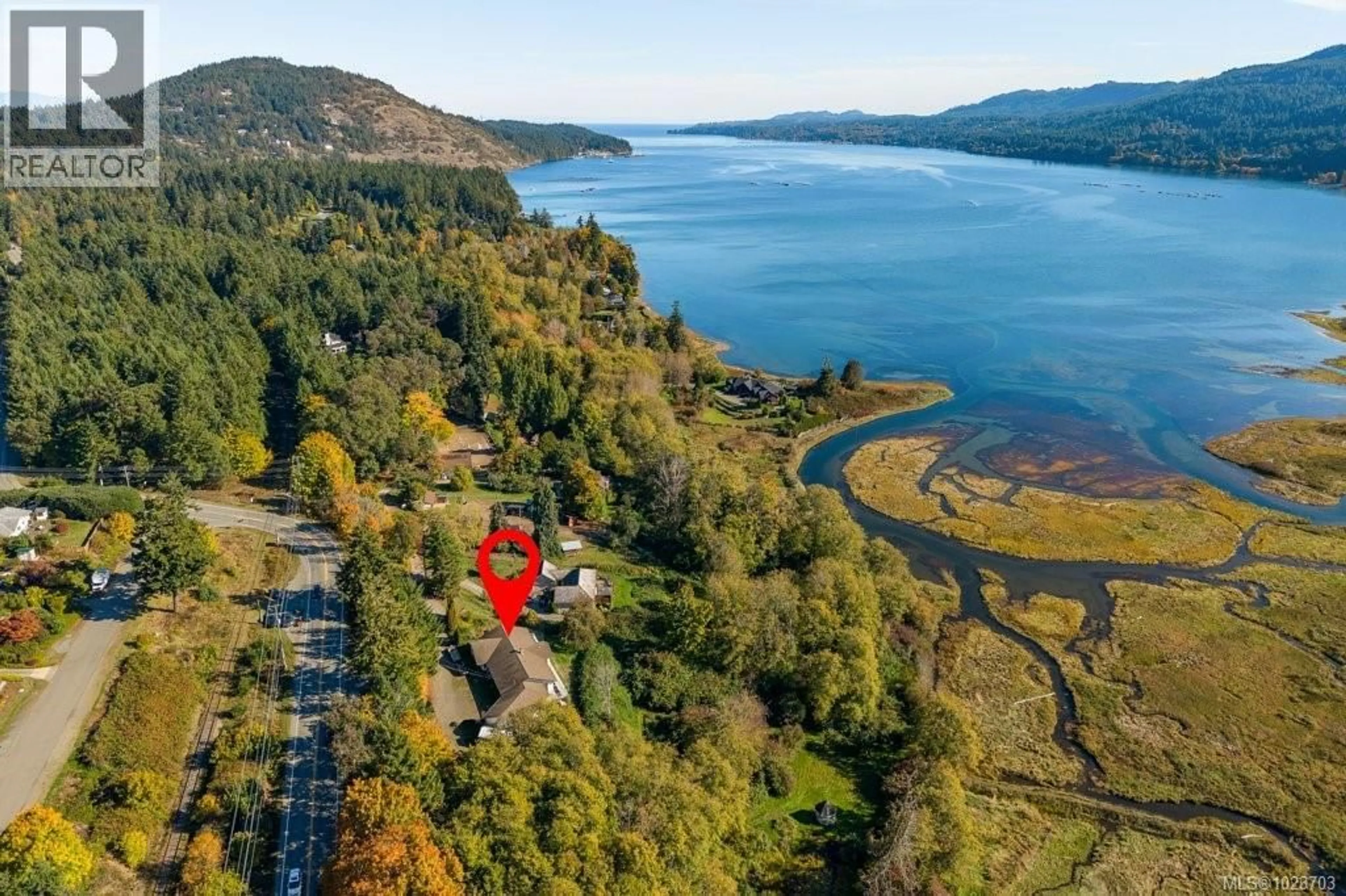 A pic from outside/outdoor area/front of a property/back of a property/a pic from drone, water/lake/river/ocean view for 2983 NORTHWEST BAY ROAD, Nanoose Bay British Columbia V9P9J9