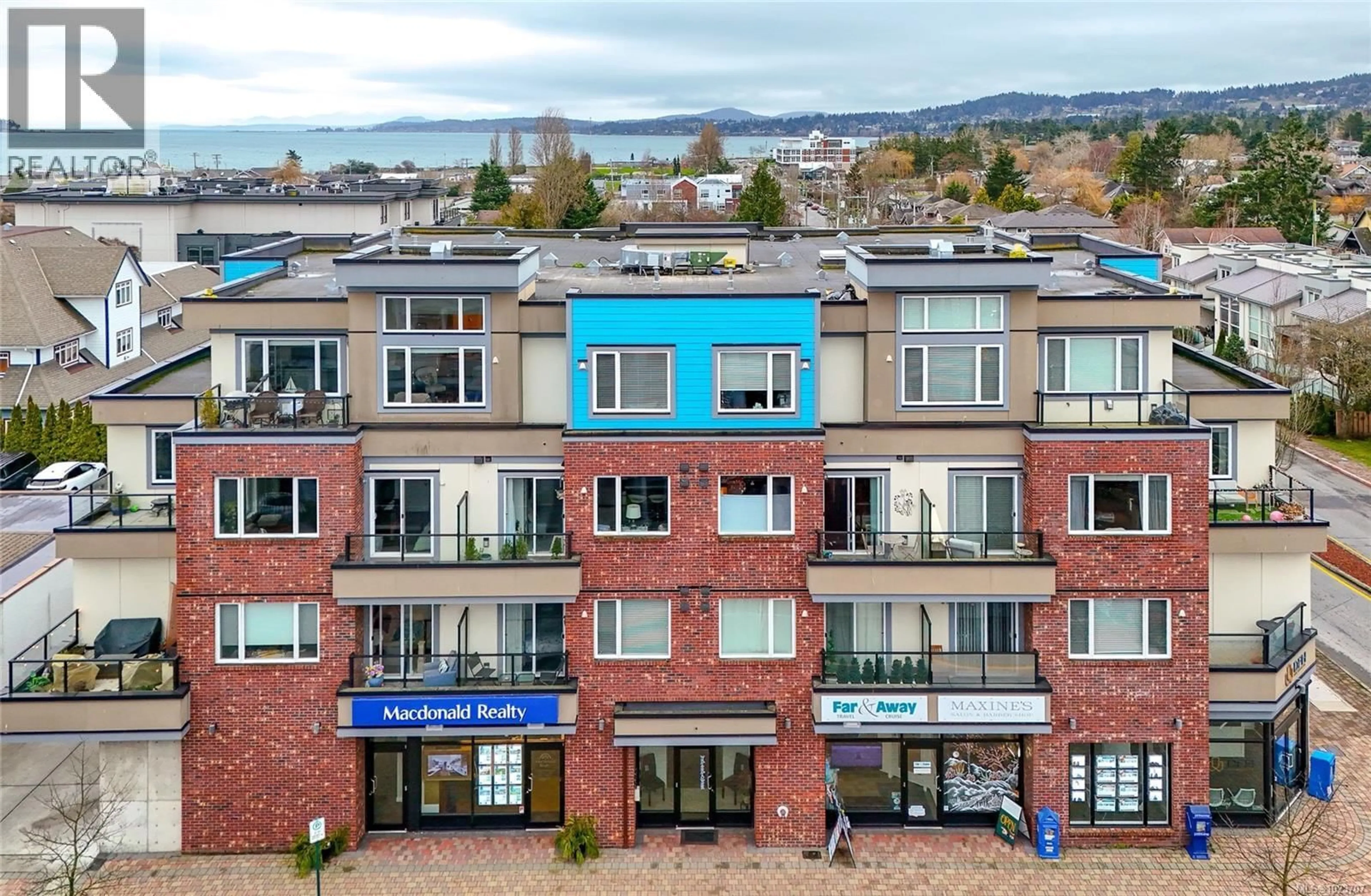 A pic from outside/outdoor area/front of a property/back of a property/a pic from drone, mountain view for 402 - 2409 BEVAN AVENUE, Sidney British Columbia V8L0C3