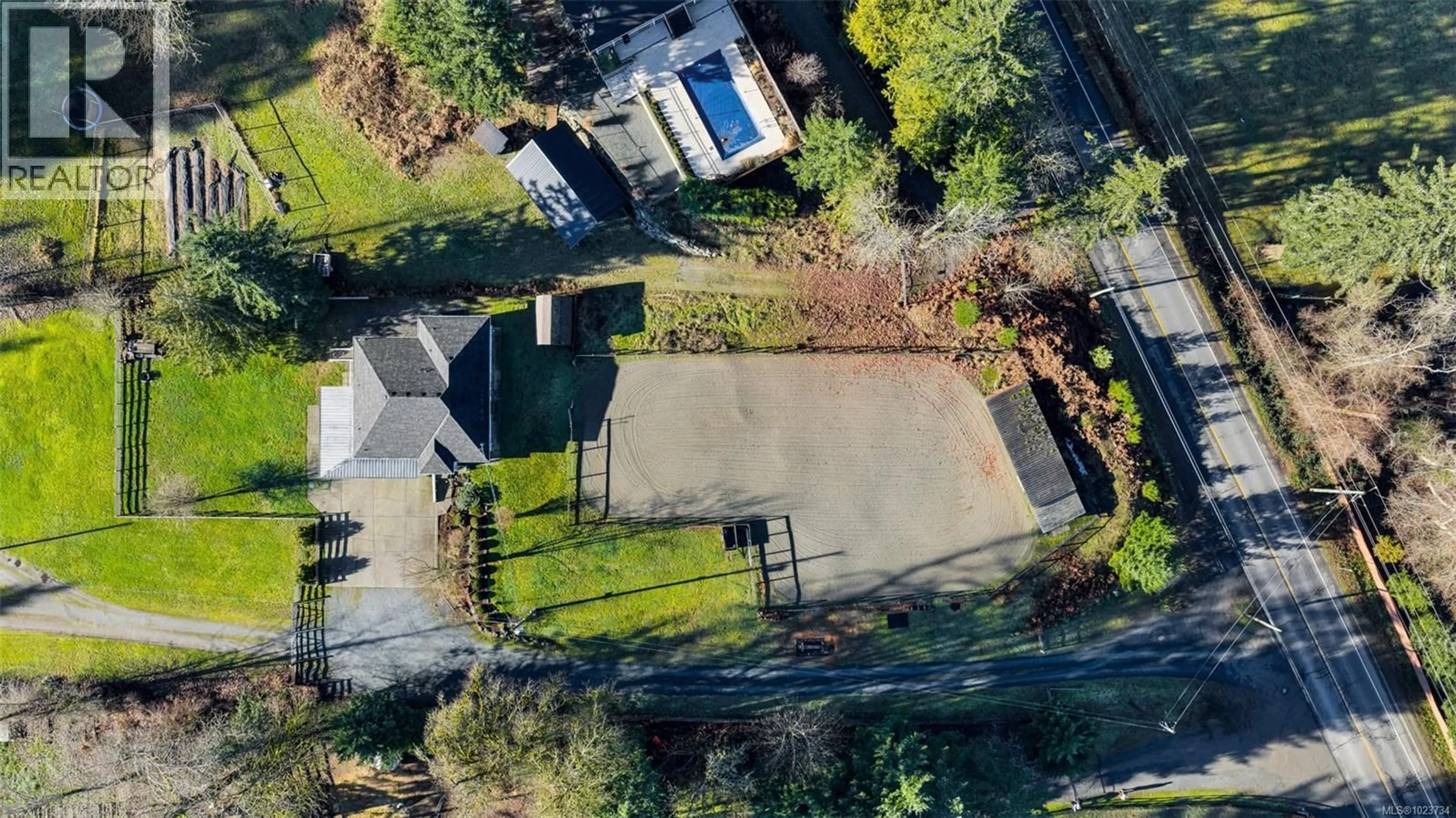 A pic from outside/outdoor area/front of a property/back of a property/a pic from drone, street for 3822 GIBBINS ROAD, Duncan British Columbia V9L6E8