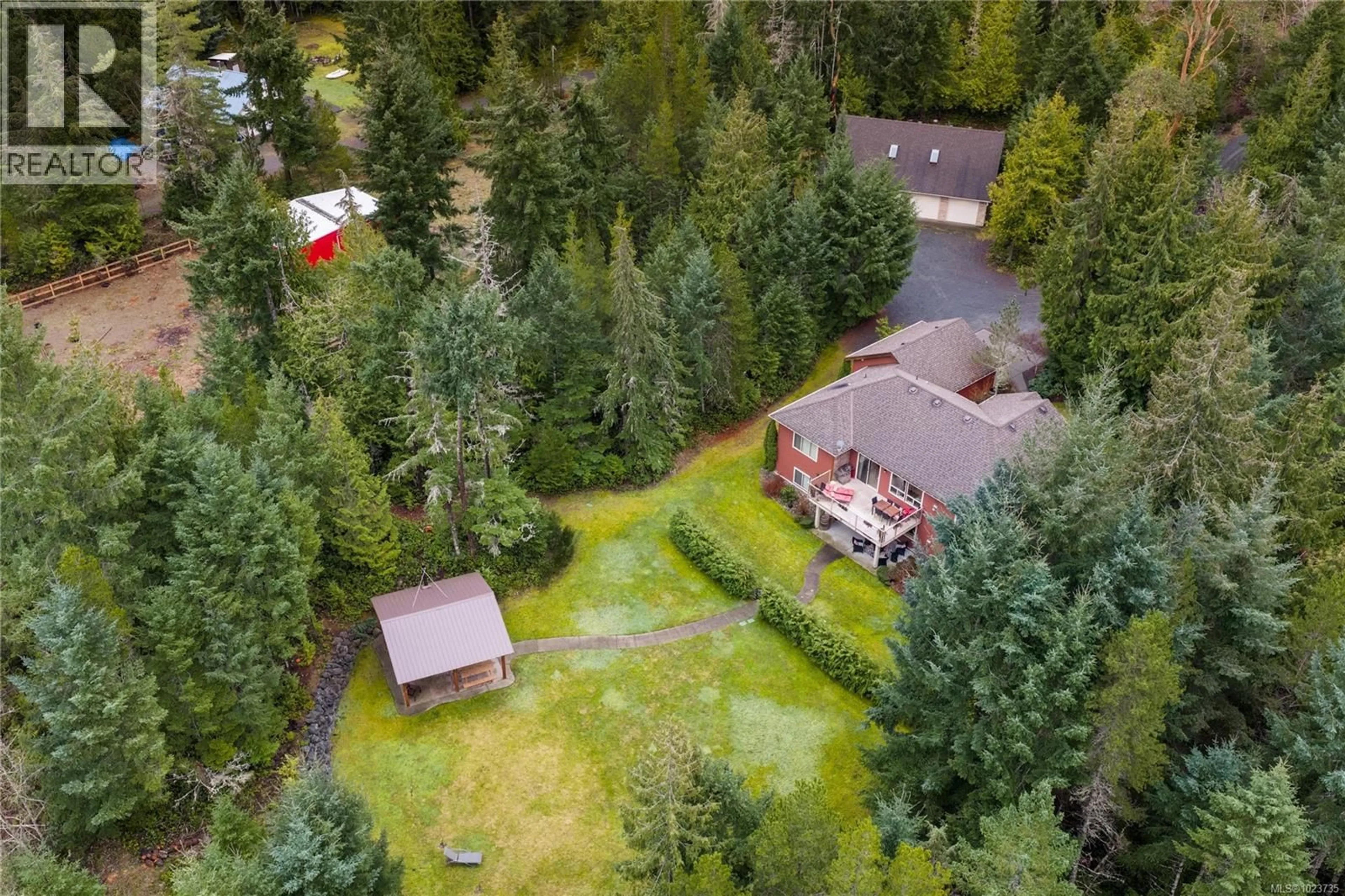 A pic from outside/outdoor area/front of a property/back of a property/a pic from drone, forest/trees view for 1755 GALVIN PLACE, Qualicum Beach British Columbia V9K2V3
