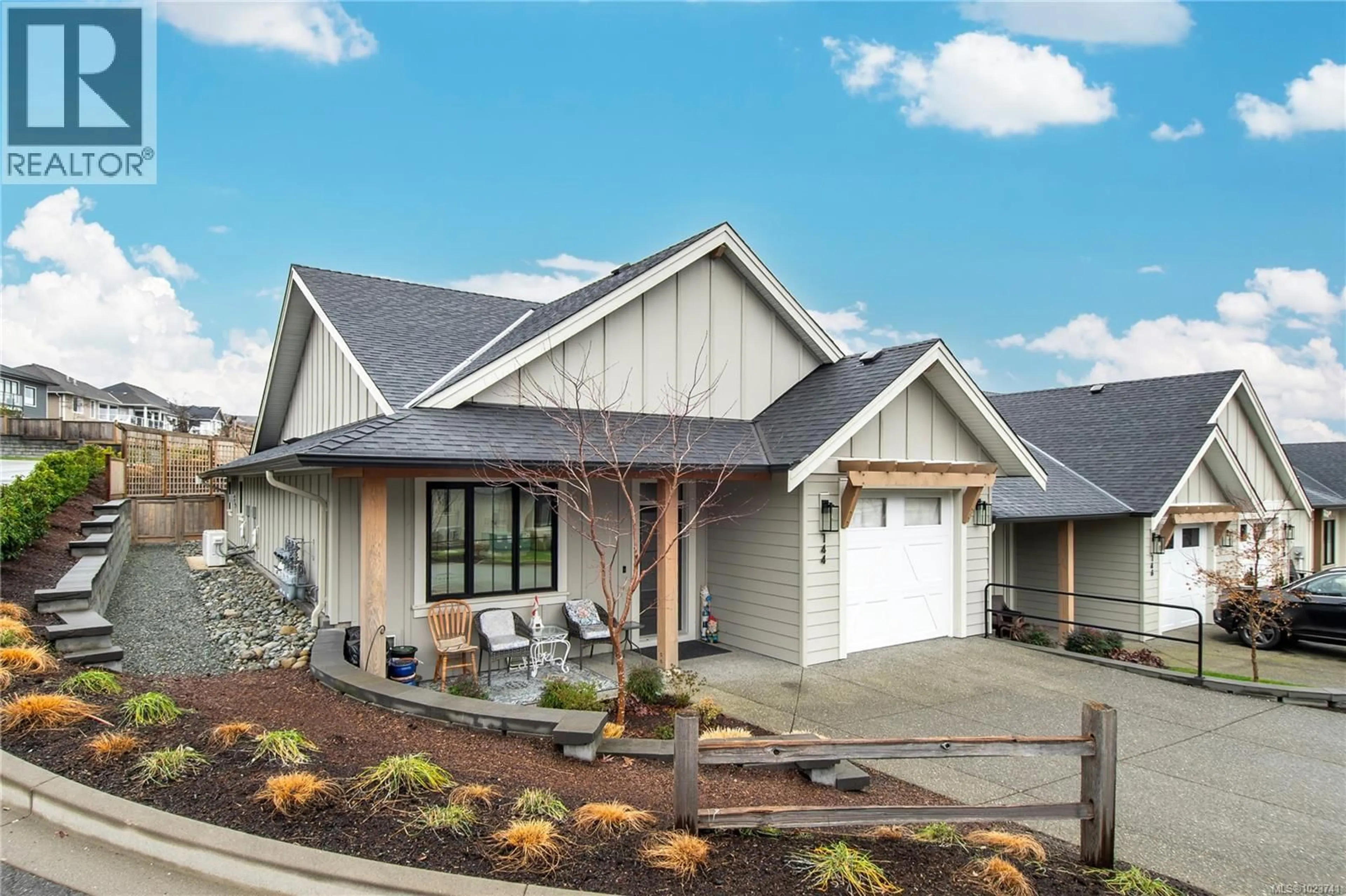 Home with vinyl exterior material, street for 144 - 4098 BUCKSTONE ROAD, Courtenay British Columbia V9N0H2