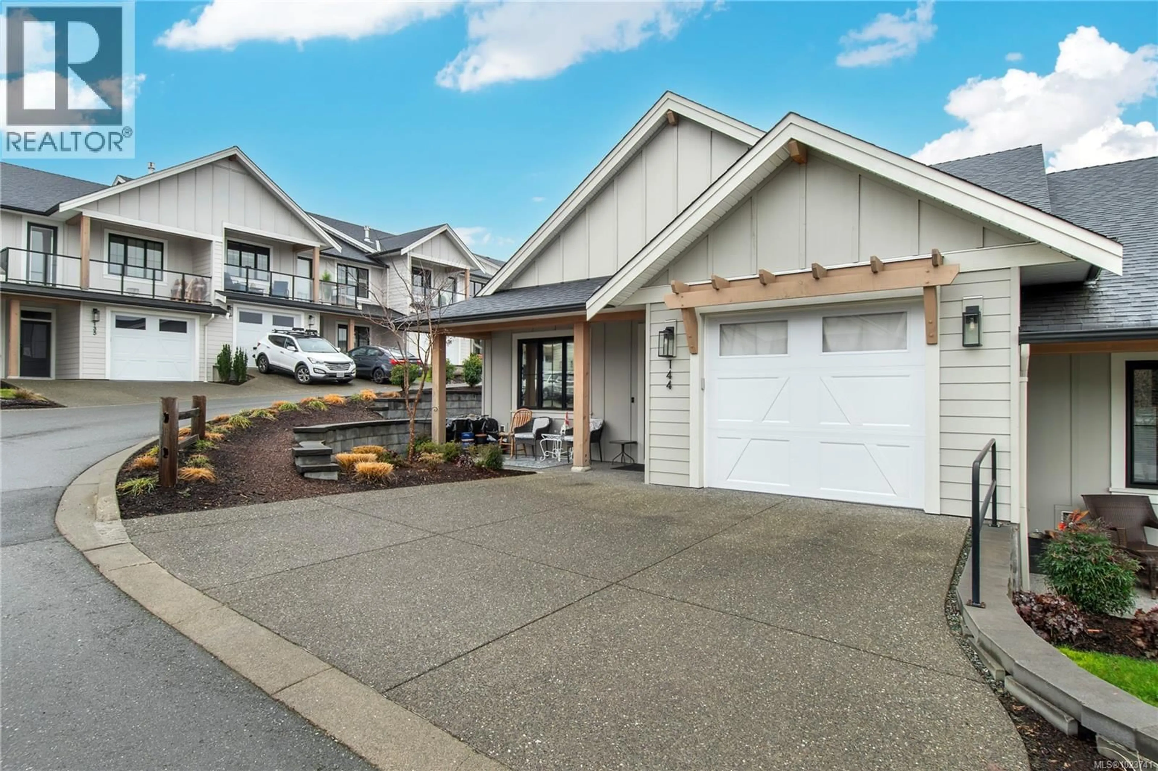 Home with vinyl exterior material, street for 144 - 4098 BUCKSTONE ROAD, Courtenay British Columbia V9N0H2