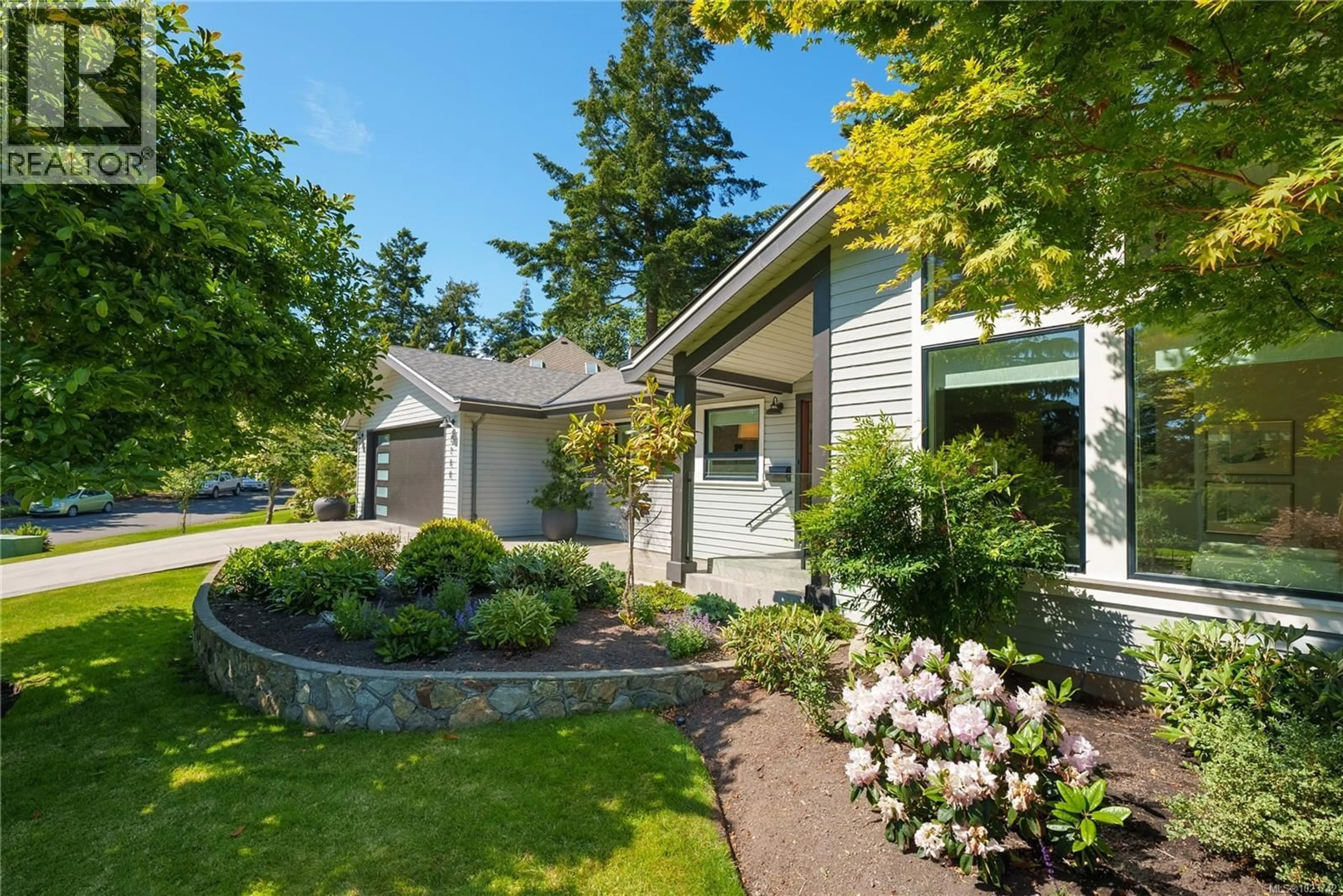 Home with vinyl exterior material, street for 2780 ARBUTUS ROAD, Saanich British Columbia V8N5X4