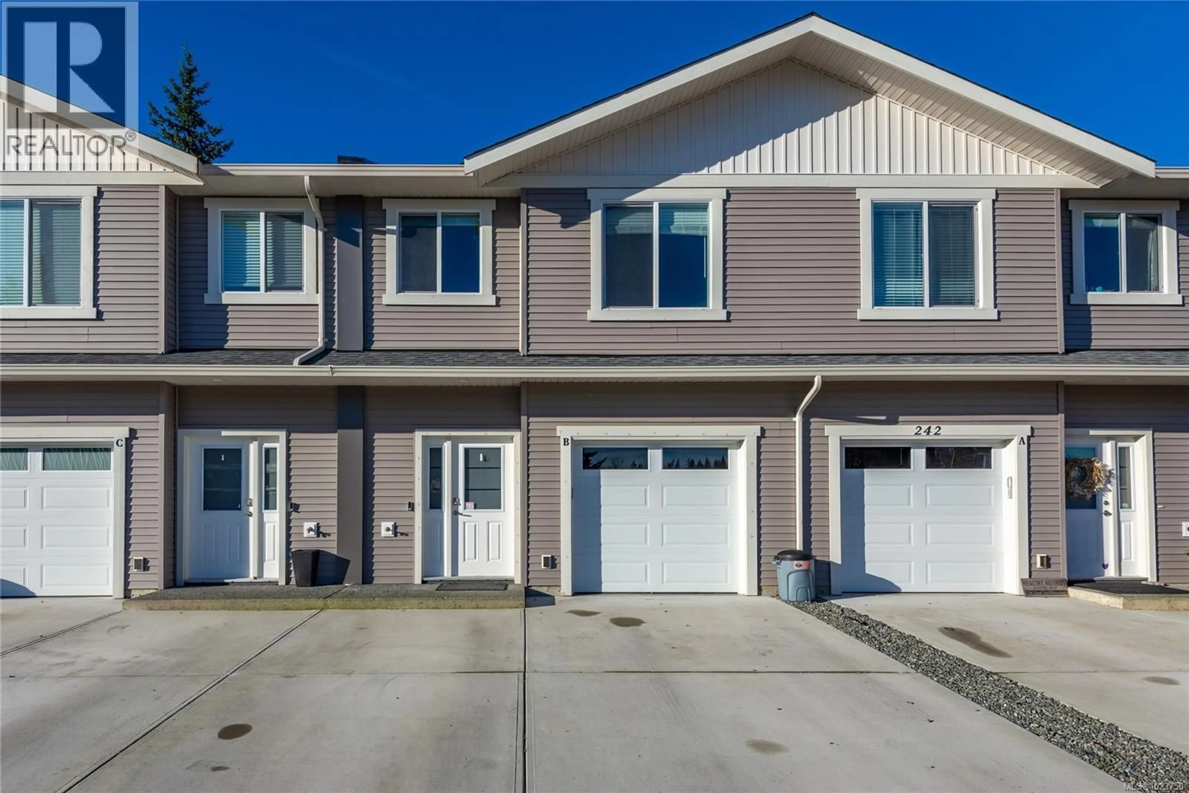 Home with vinyl exterior material, street for B - 242 PETERSEN ROAD, Campbell River British Columbia V9W3H4