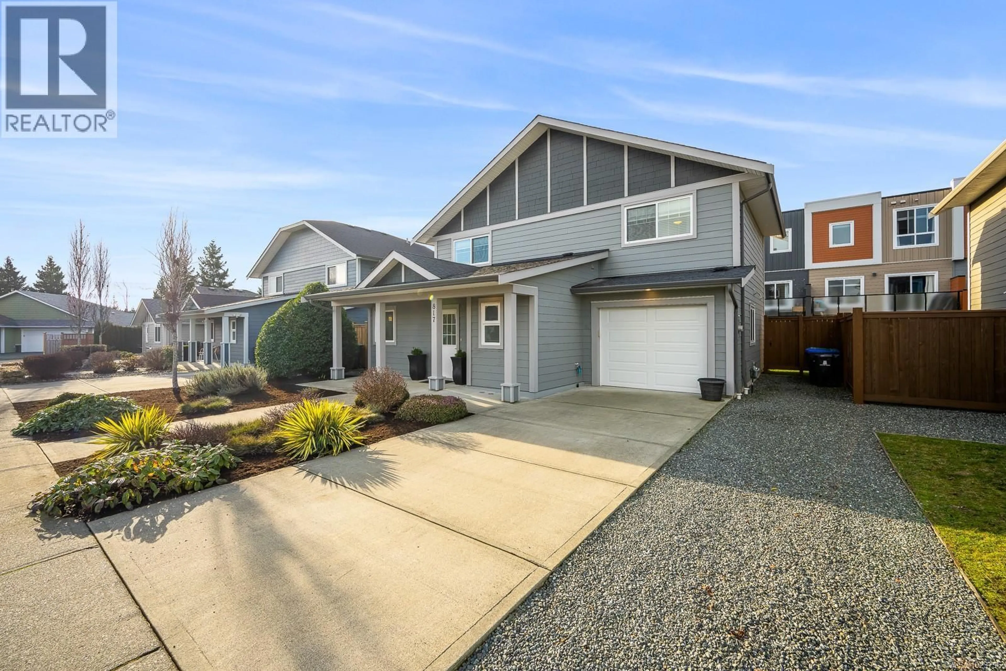 Home with vinyl exterior material, street for 817 TRACKER PLACE, Comox British Columbia V9M4E8