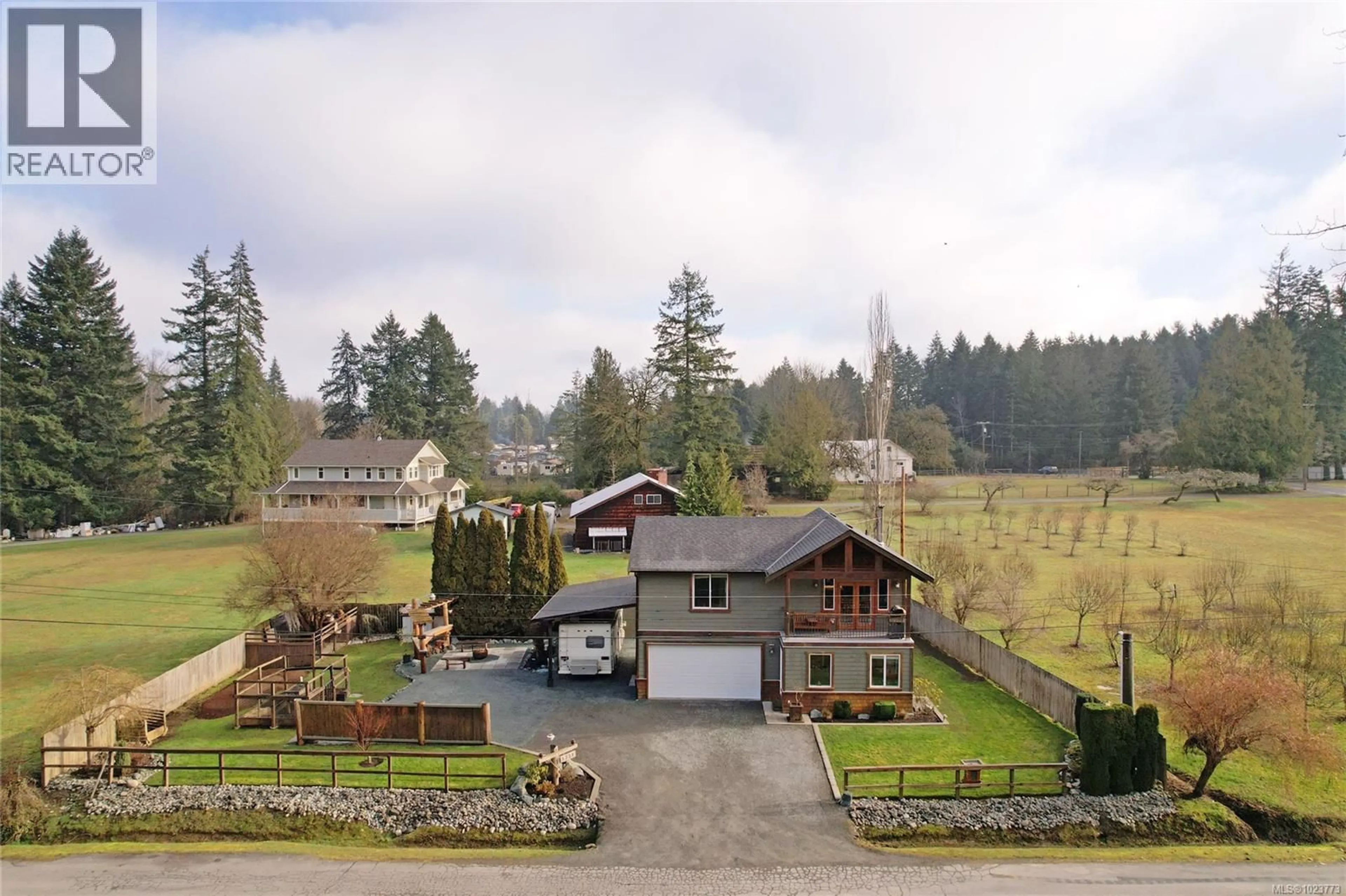 A pic from outside/outdoor area/front of a property/back of a property/a pic from drone, mountain view for 5729 VAN KOY ROAD, Duncan British Columbia V9L6E7