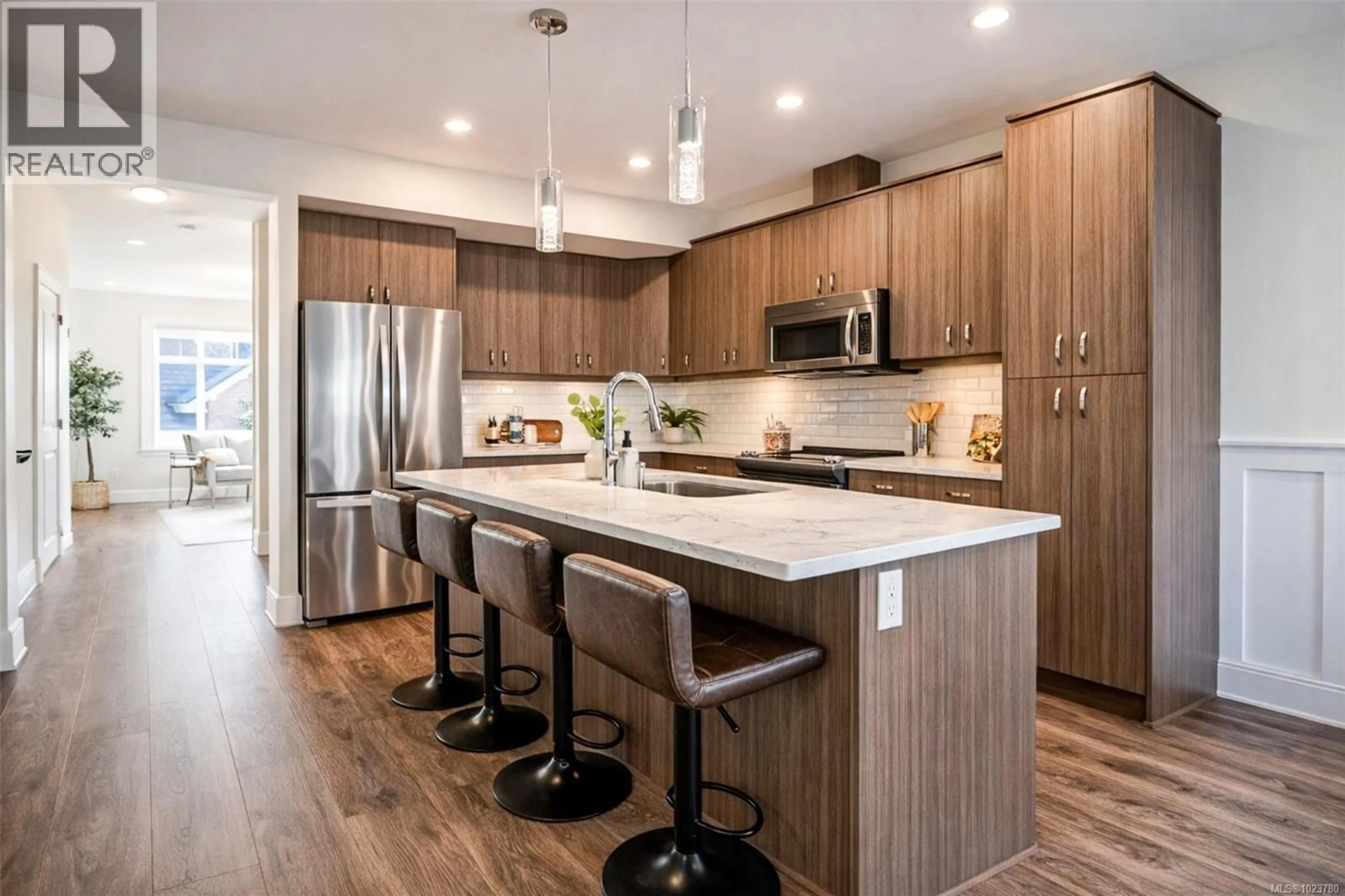 Contemporary kitchen, wood/laminate floor for 1438 COMMANDER COURT, Langford British Columbia V8Z5A3