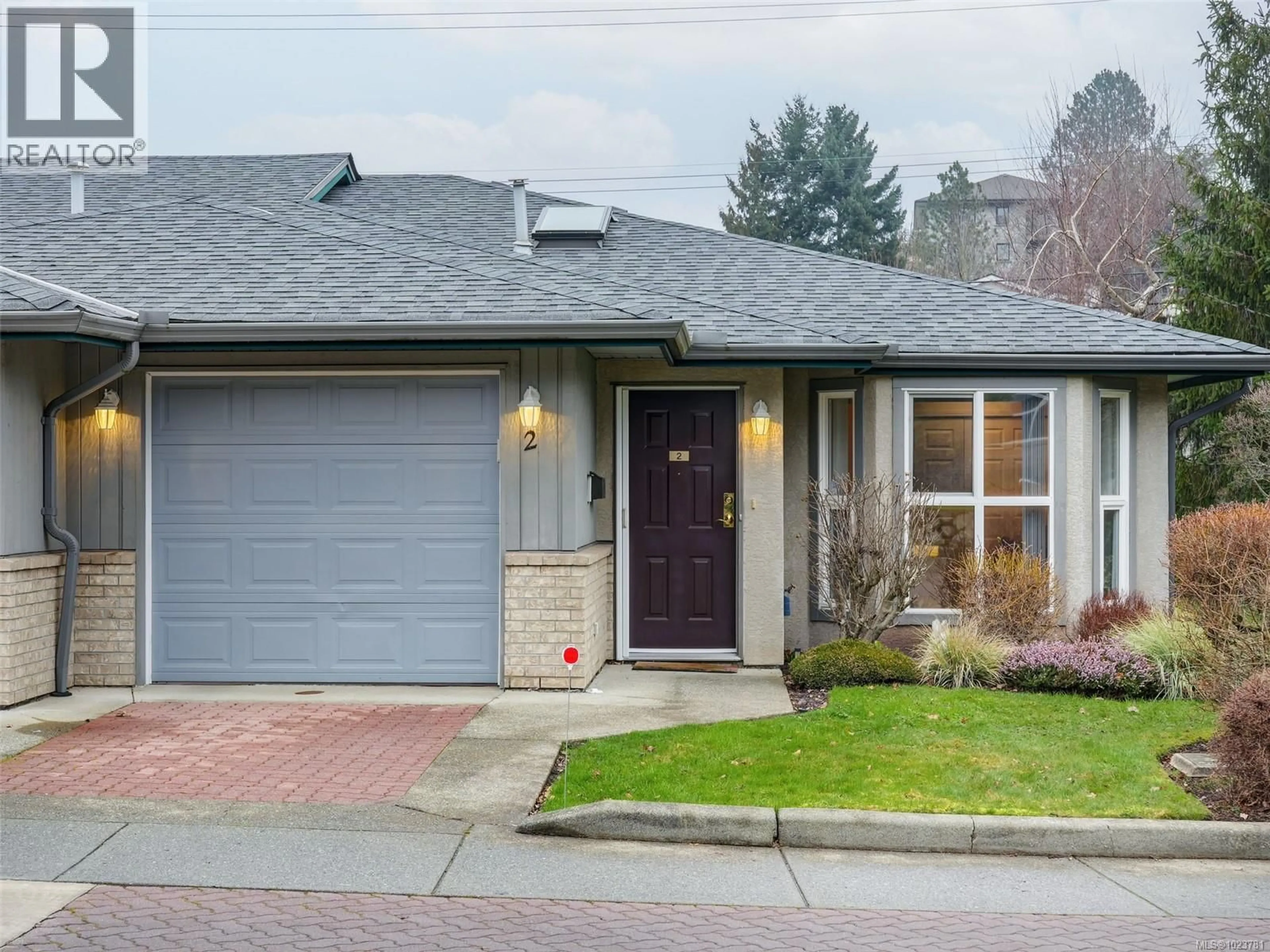 Home with brick exterior material, street for 2 - 1473 GARNET ROAD, Saanich British Columbia V8P5T5