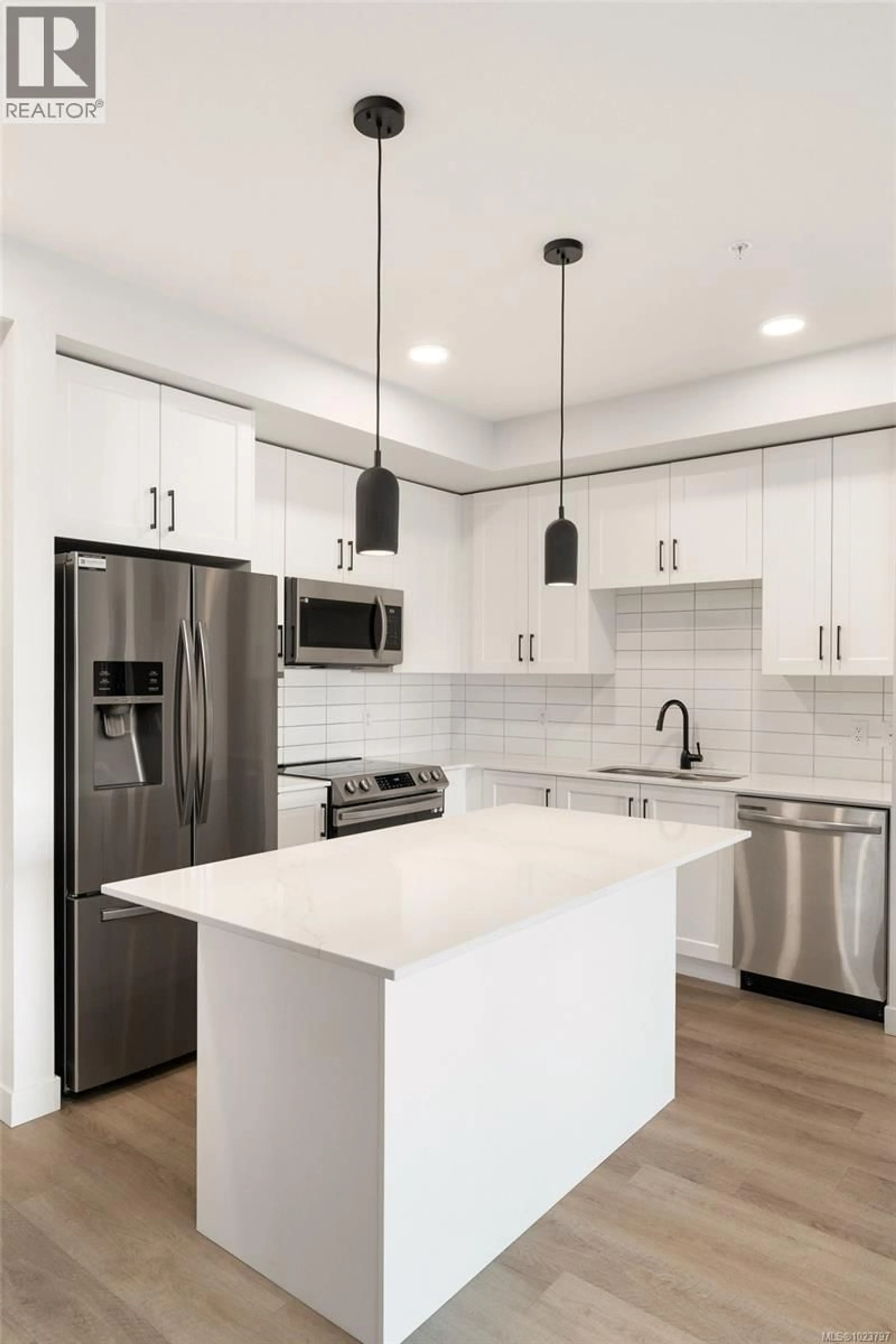 Open concept kitchen, unknown for 408 - 2469 GATEWAY ROAD, Langford British Columbia V9B6R7