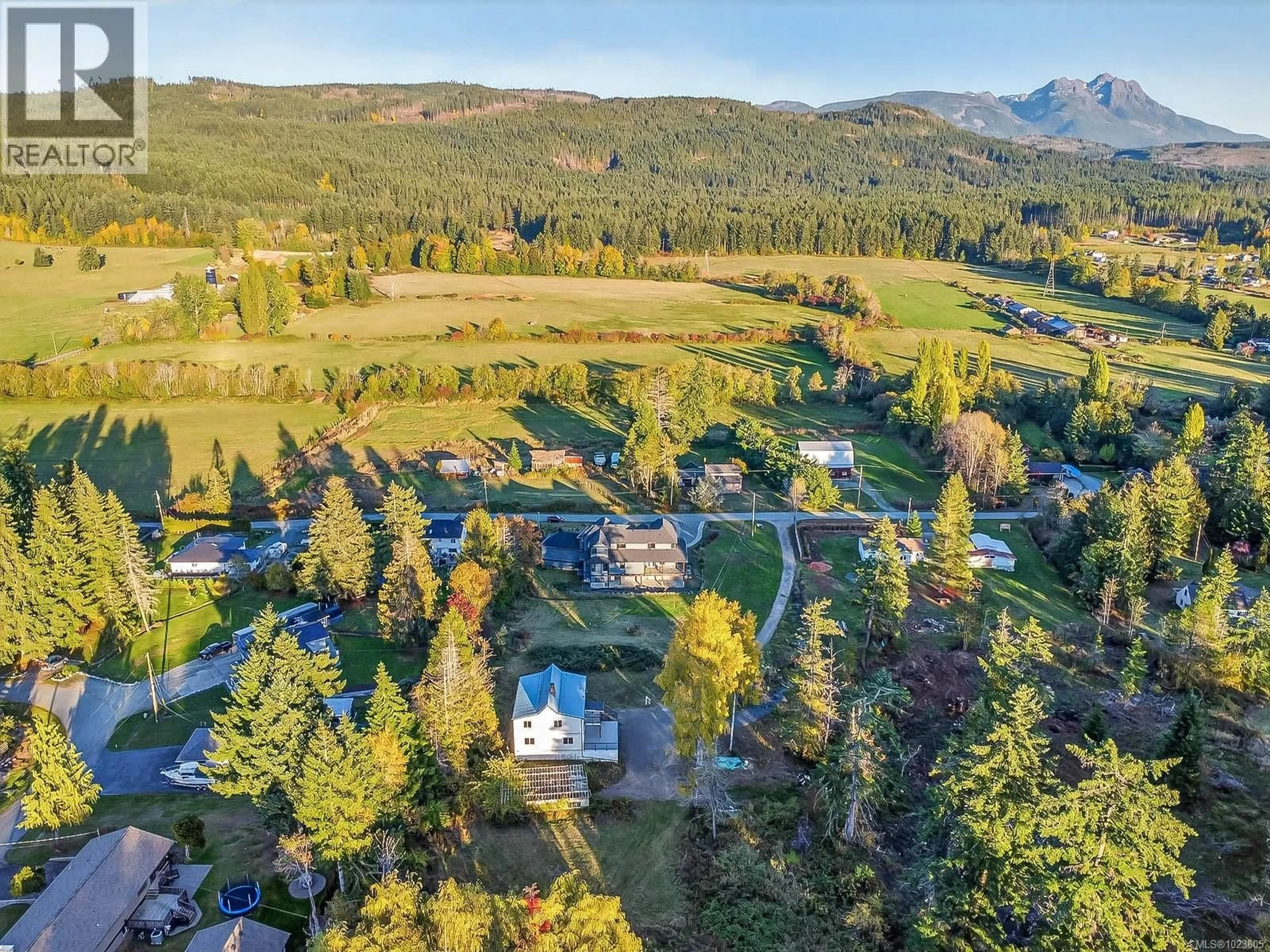 A pic from outside/outdoor area/front of a property/back of a property/a pic from drone, mountain view for 6118 COTTAM ROAD, Port Alberni British Columbia V9Y8R9