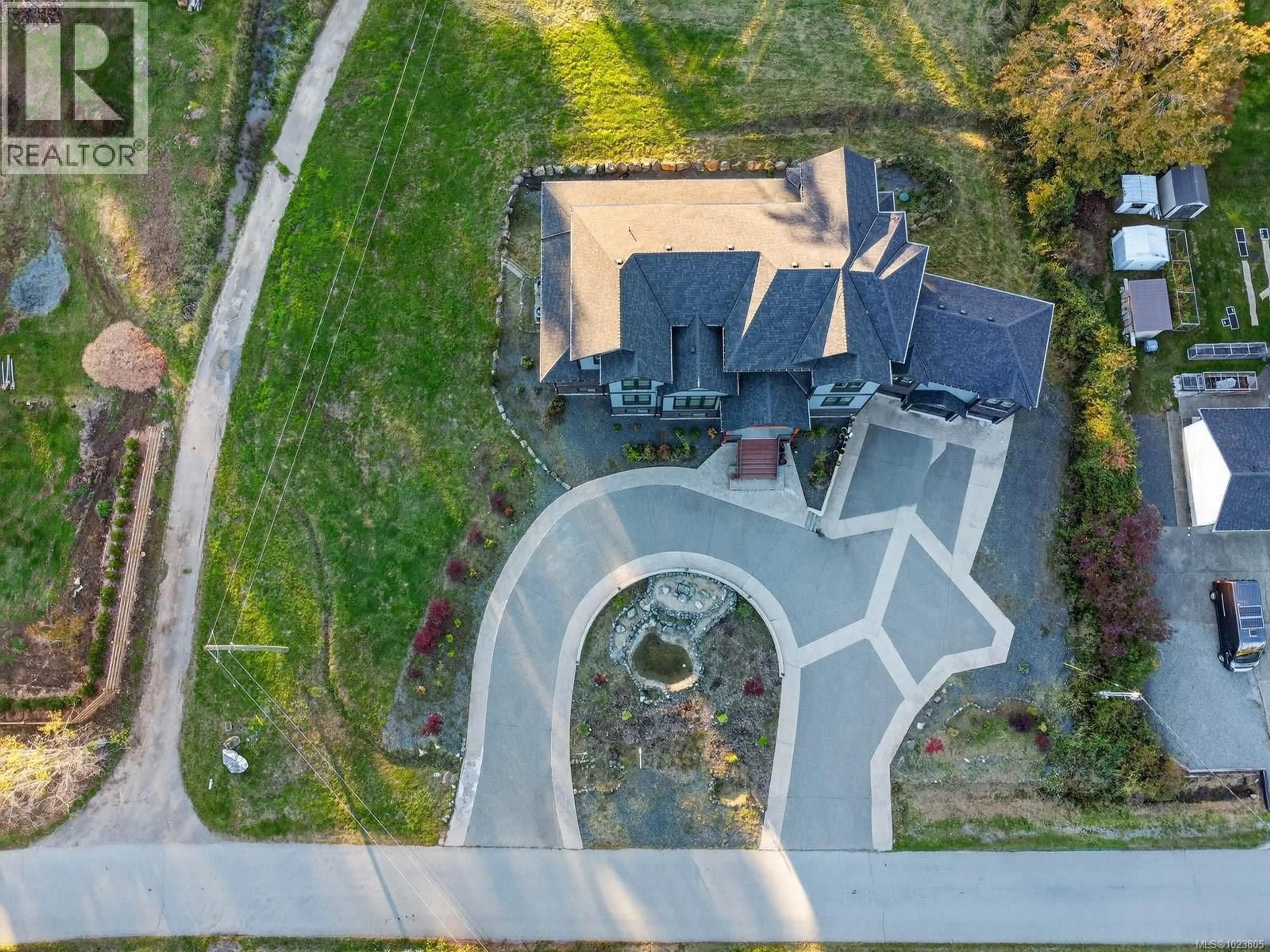 A pic from outside/outdoor area/front of a property/back of a property/a pic from drone, street for 6118 COTTAM ROAD, Port Alberni British Columbia V9Y8R9