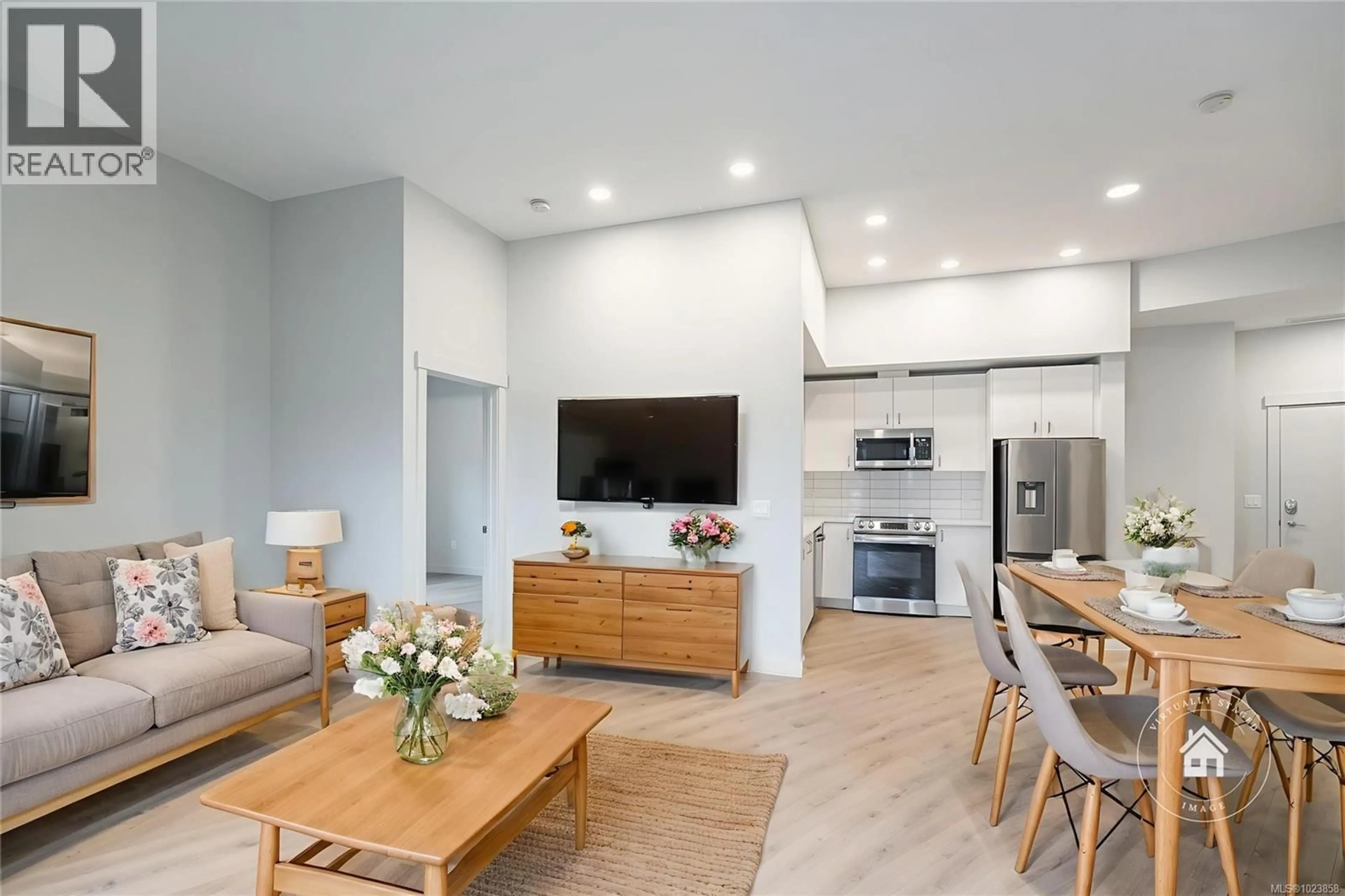 Open concept kitchen, wood/laminate floor for 104 - 164 ALBERNI HIGHWAY, Parksville British Columbia V9P0H8