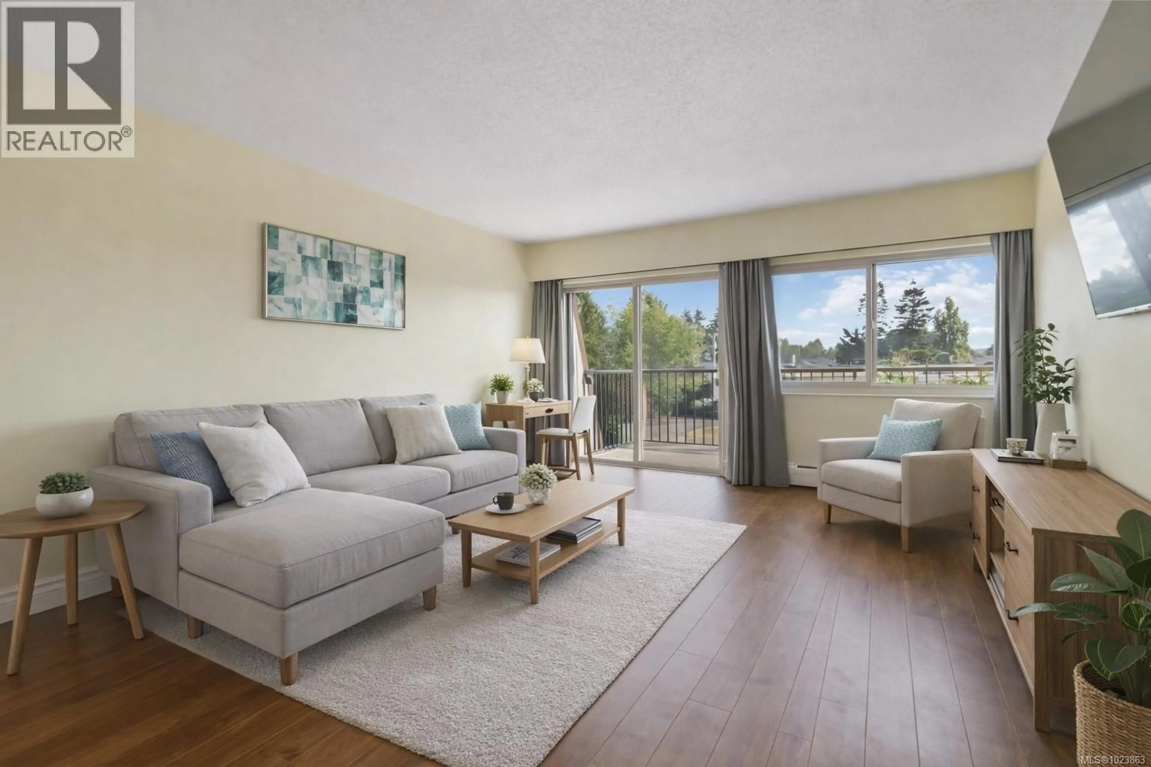 Living room with furniture, wood/laminate floor for 304 - 1680 POPLAR AVENUE, Saanich British Columbia V8P4K7