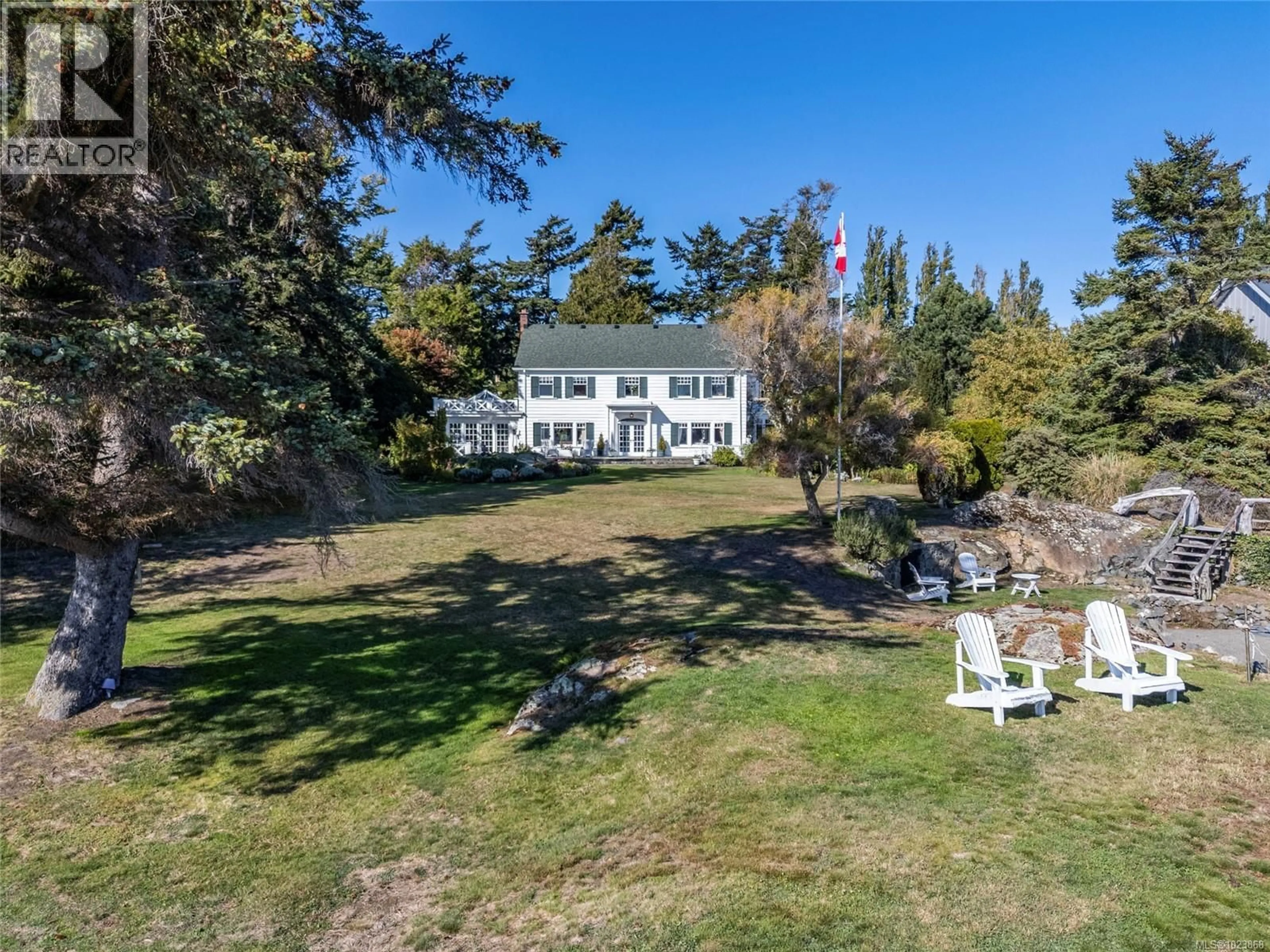 A pic from outside/outdoor area/front of a property/back of a property/a pic from drone, unknown for 3045 MCANALLY ROAD, Saanich British Columbia V8N1T3