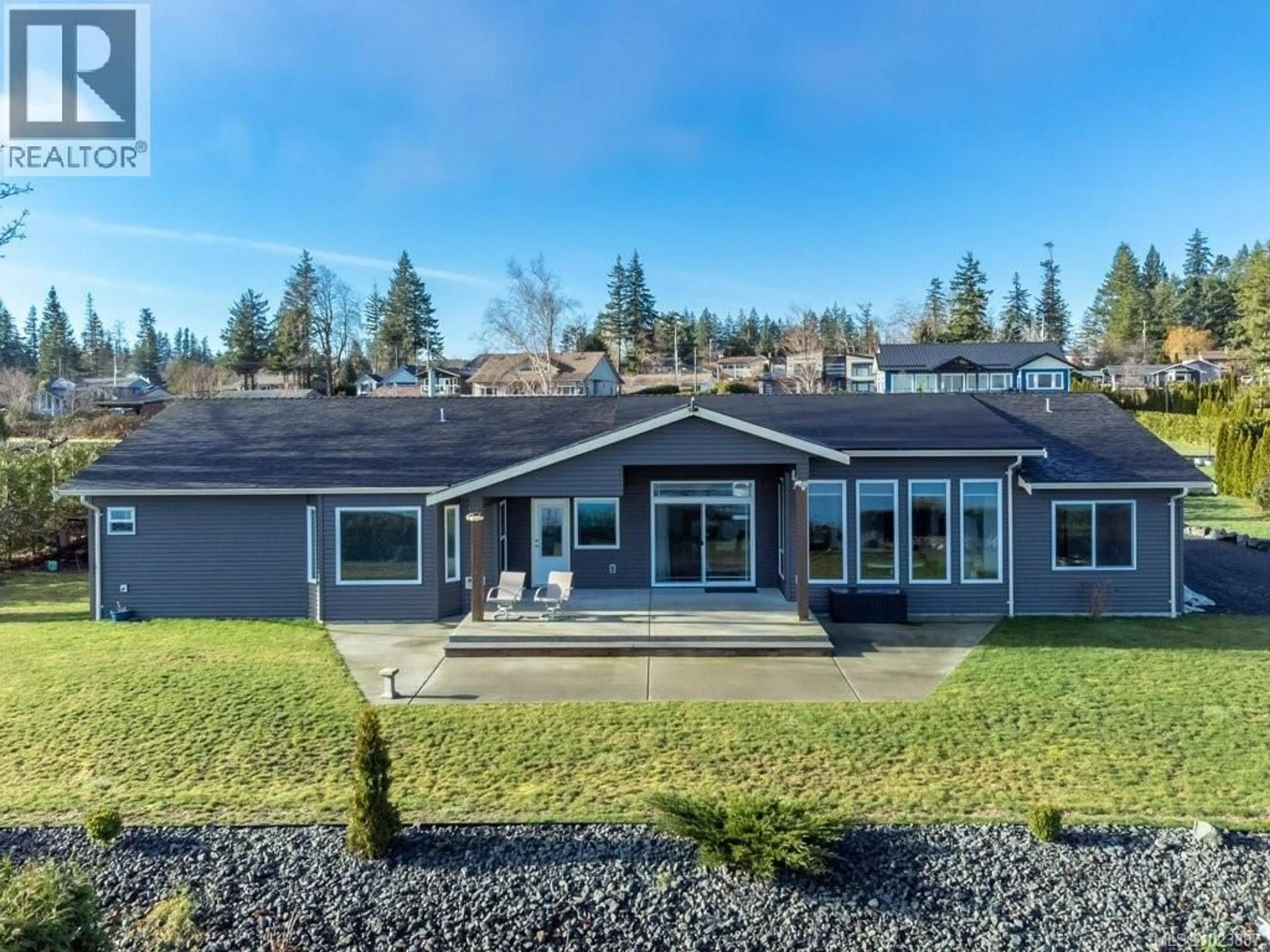 A pic from outside/outdoor area/front of a property/back of a property/a pic from drone, mountain view for 3885 DISCOVERY DRIVE, Campbell River British Columbia V9W4W5
