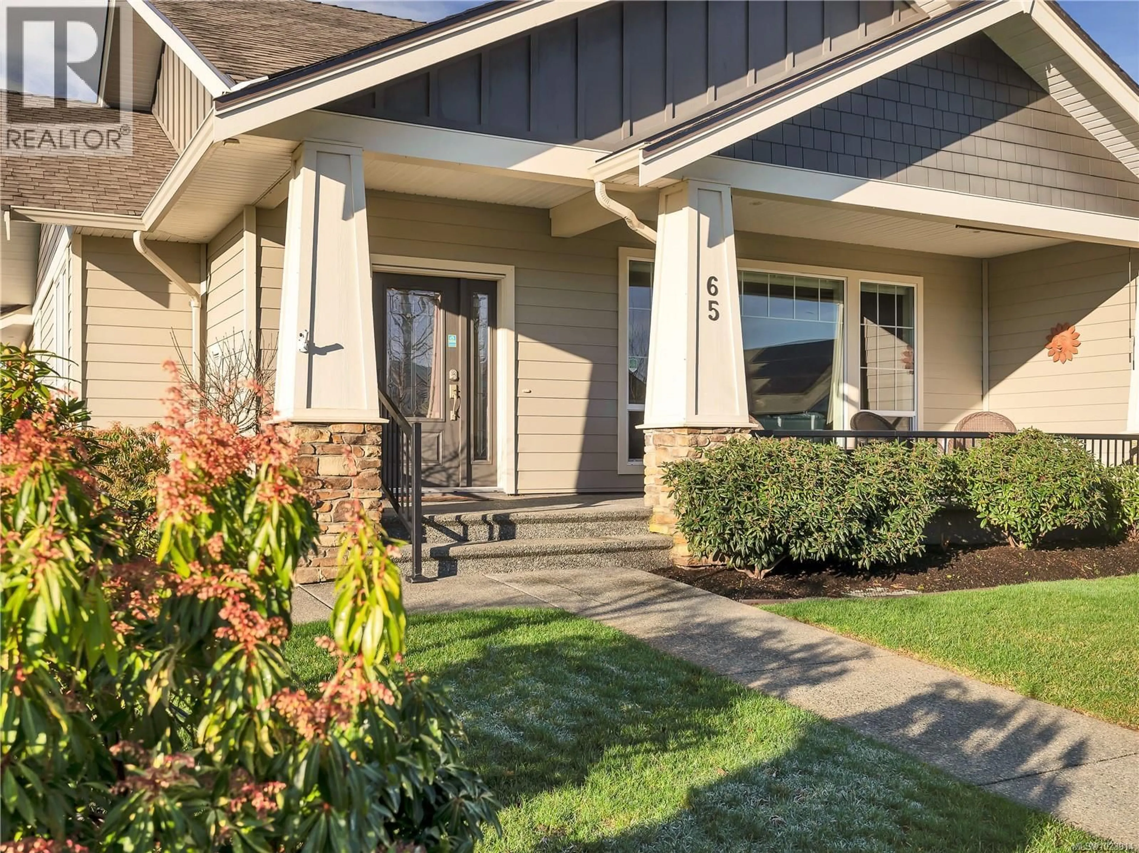 Home with vinyl exterior material, street for 65 NIKOLA ROAD, Campbell River British Columbia V9W0C9