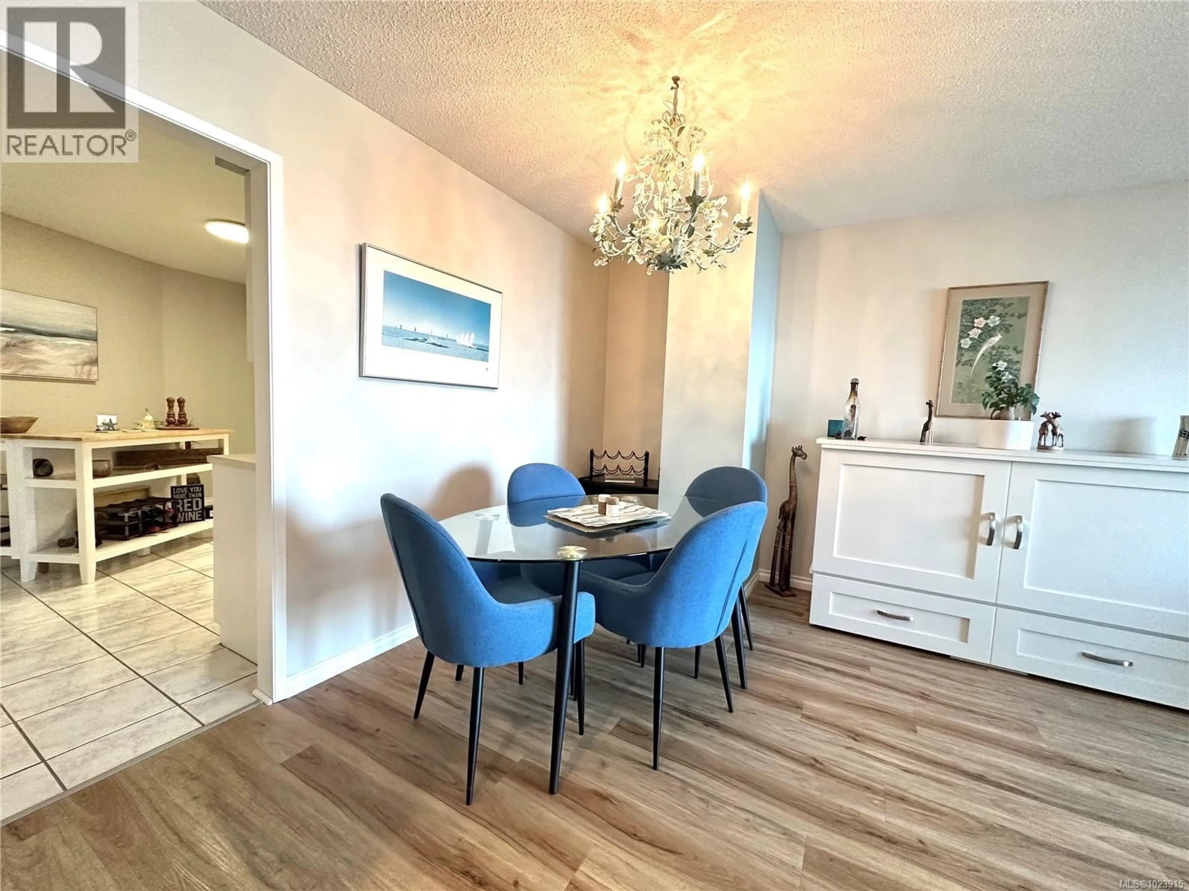 Dining room, wood/laminate floor for 207 - 3555 OUTRIGGER ROAD, Nanoose Bay British Columbia V9P9K1