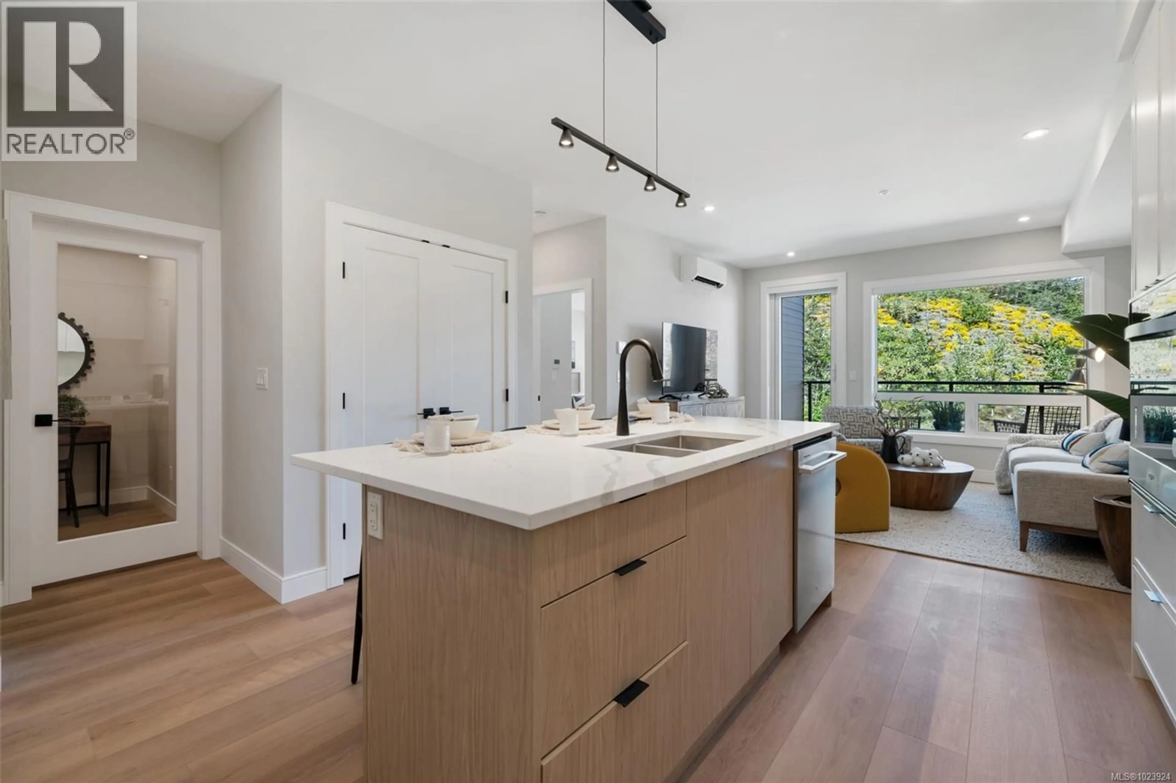 Open concept kitchen, unknown for 307 - 1810 SELENITE PLACE, Langford British Columbia V9B7E2