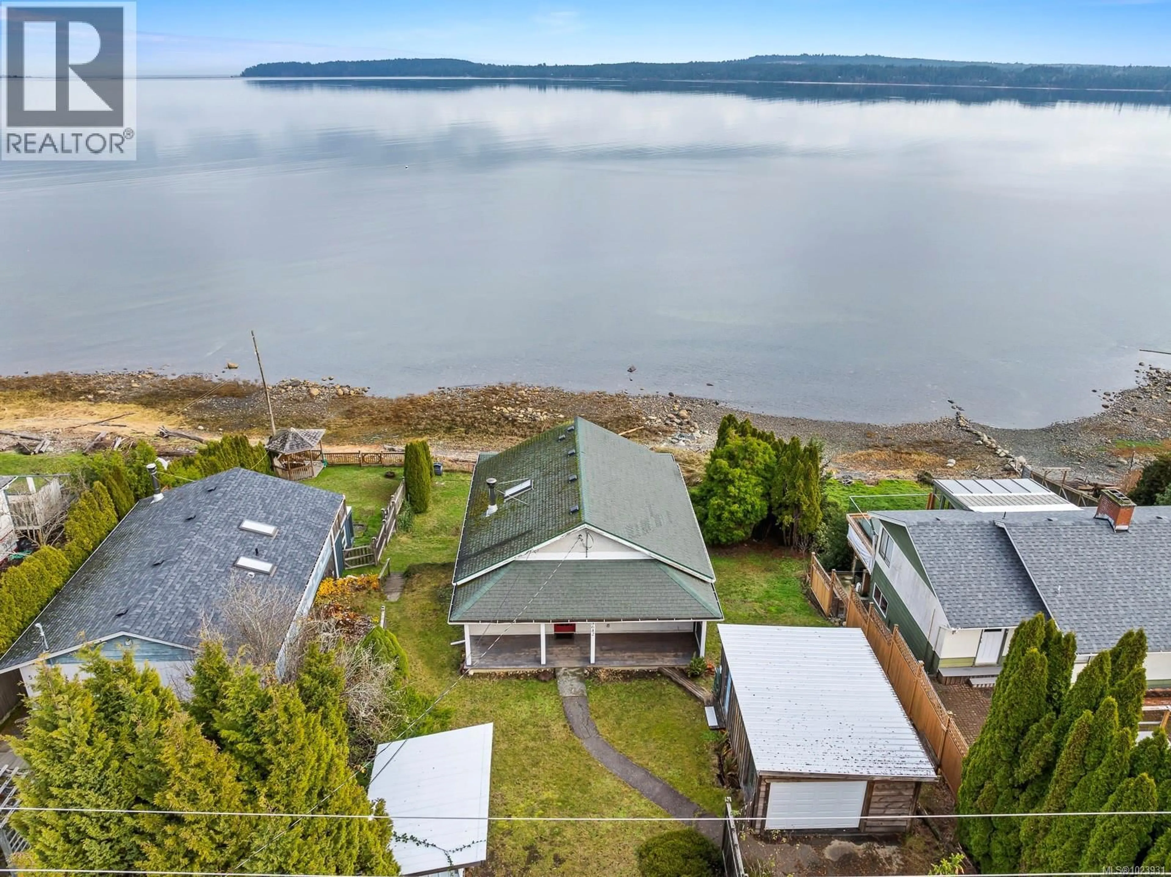 A pic from outside/outdoor area/front of a property/back of a property/a pic from drone, water/lake/river/ocean view for 5642 ISLAND HIGHWAY SOUTH, Union Bay British Columbia V0R3B0