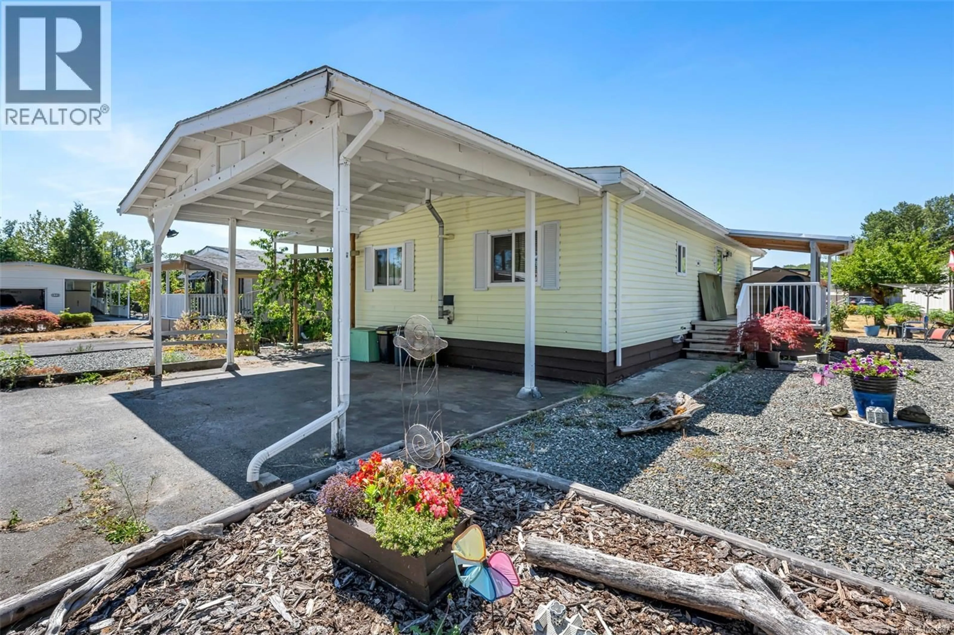 Home with vinyl exterior material, street for 1016 - 2885 BOYS ROAD, Duncan British Columbia V9L4Y9