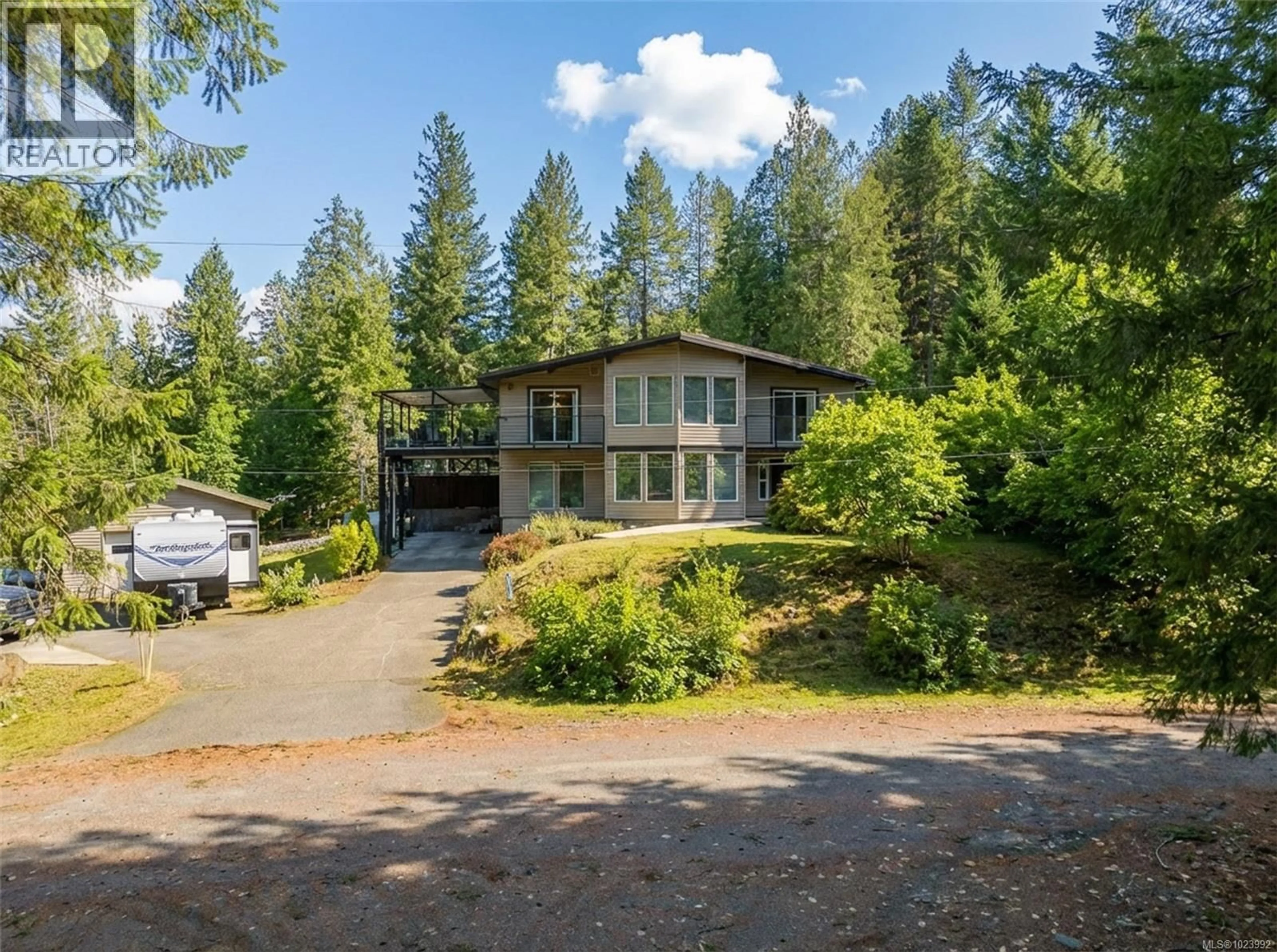 A pic from outside/outdoor area/front of a property/back of a property/a pic from drone, forest/trees view for 10115 SOUTH DRIVE, Port Alberni British Columbia V9Y9A7