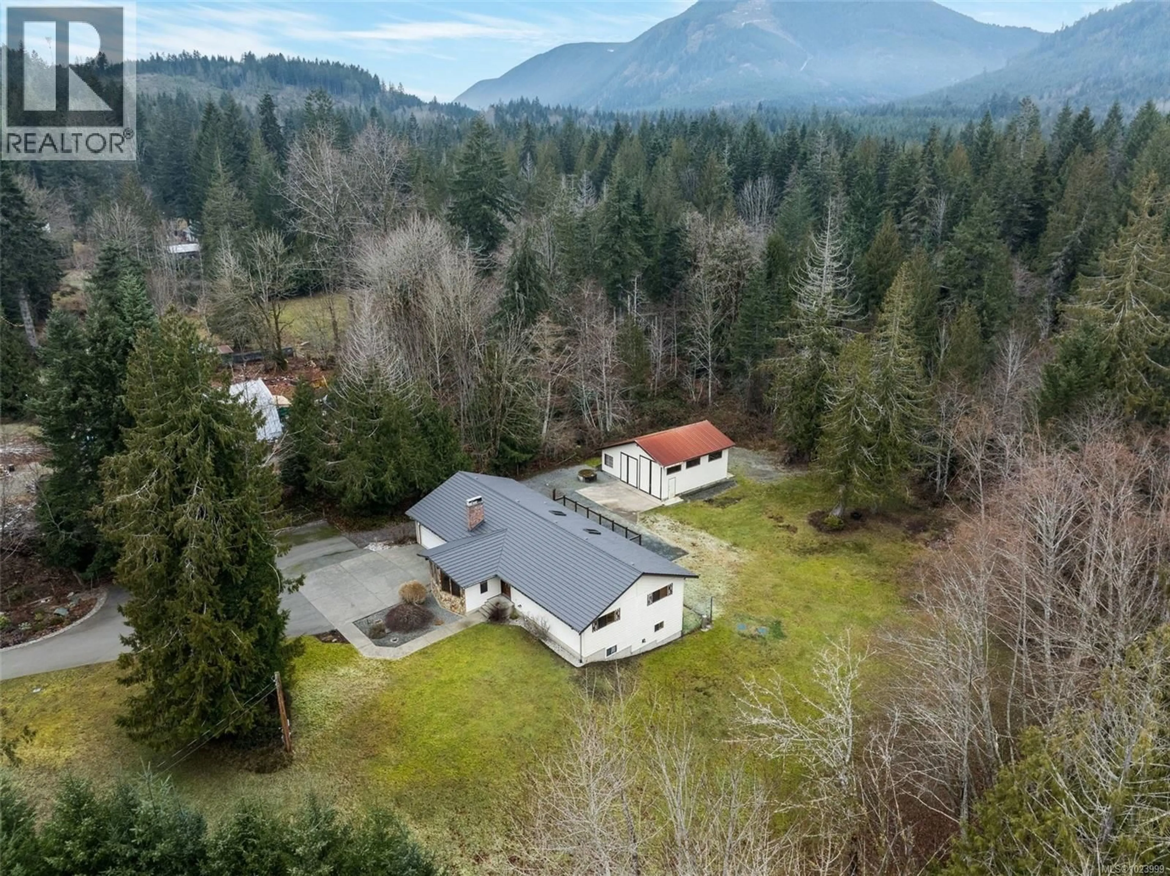 A pic from outside/outdoor area/front of a property/back of a property/a pic from drone, mountain view for 8335 YOUBOU ROAD, Lake Cowichan British Columbia V0R2G0