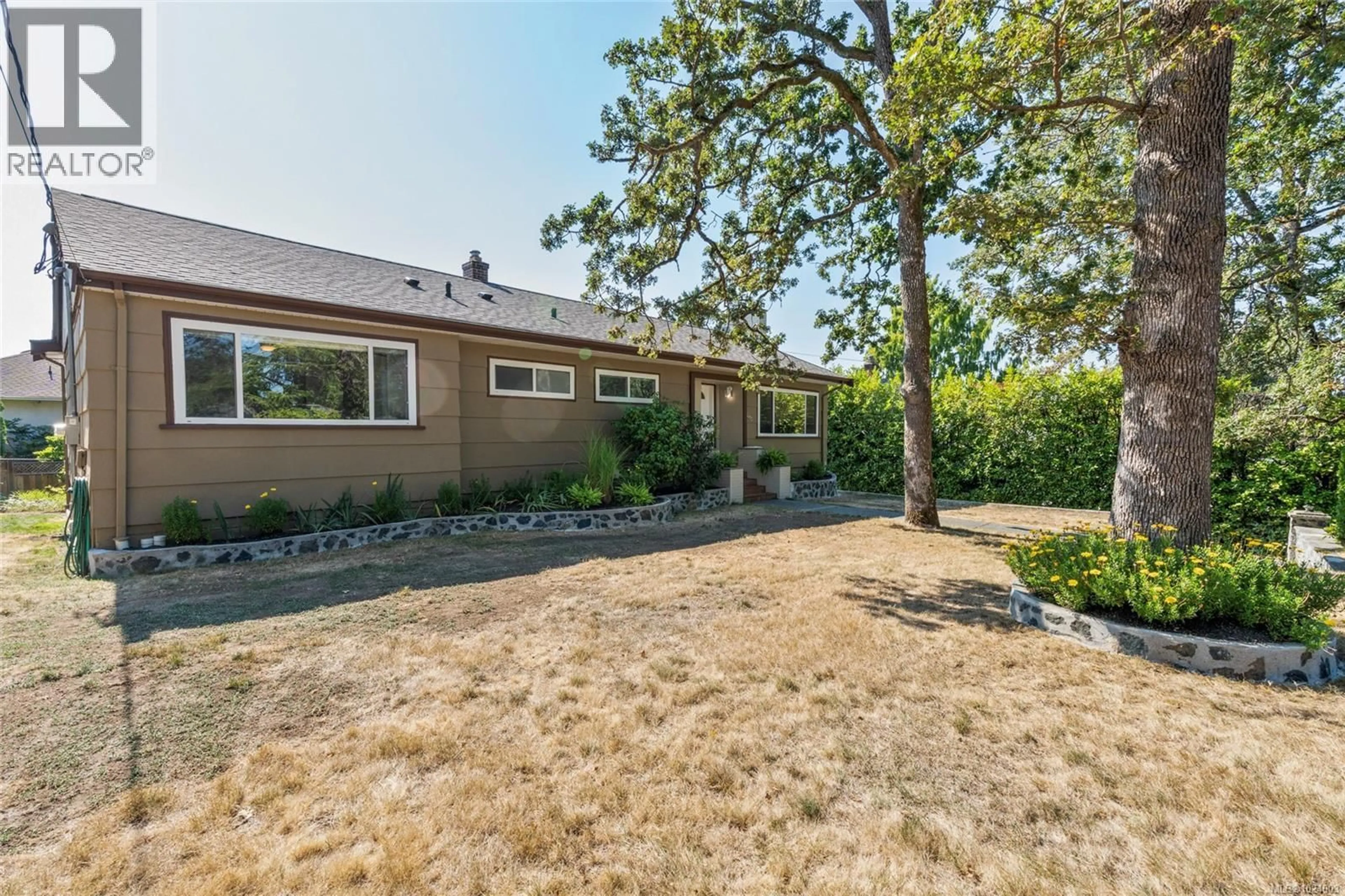 A pic from outside/outdoor area/front of a property/back of a property/a pic from drone, mountain view for 3944 CEDAR HILL CROSS ROAD, Saanich British Columbia V8P2N6