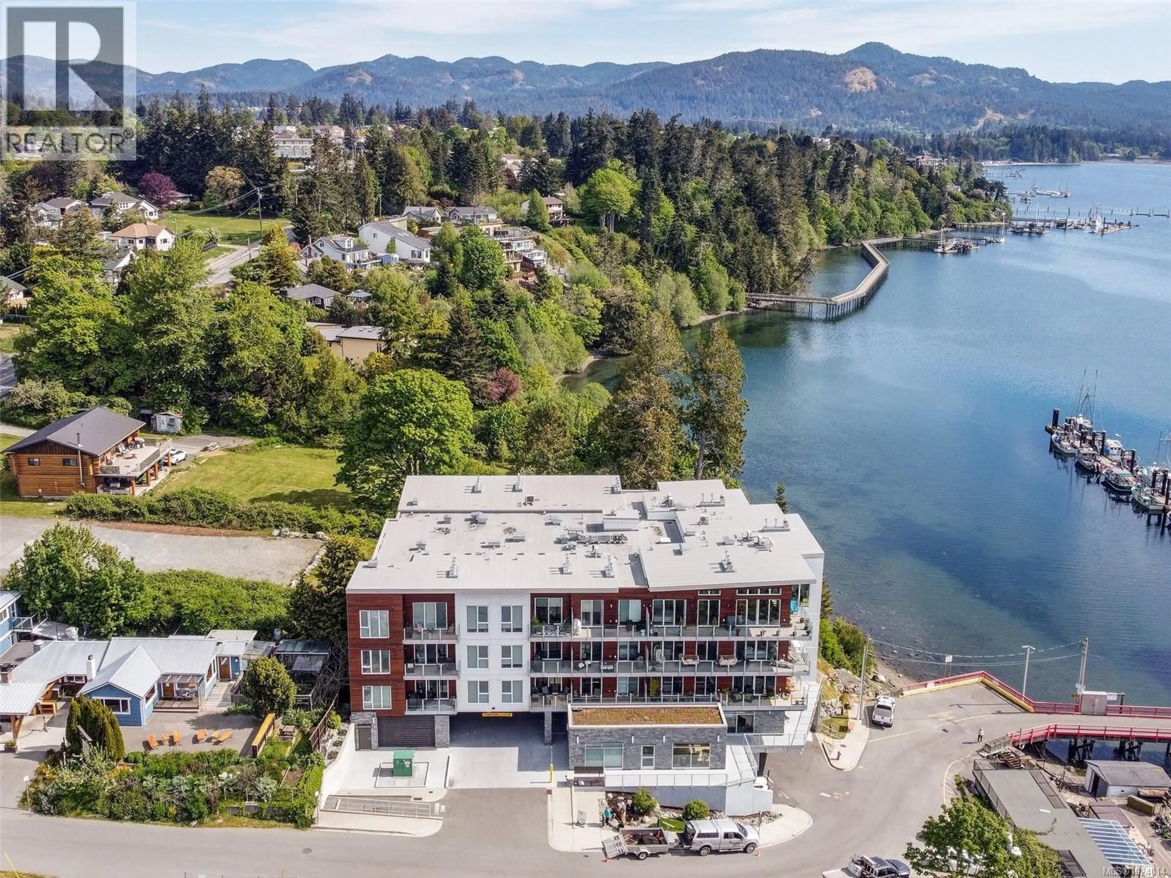 A pic from outside/outdoor area/front of a property/back of a property/a pic from drone, water/lake/river/ocean view for 402 - 1820 MAPLE AVENUE SOUTH, Sooke British Columbia V9Z0N9