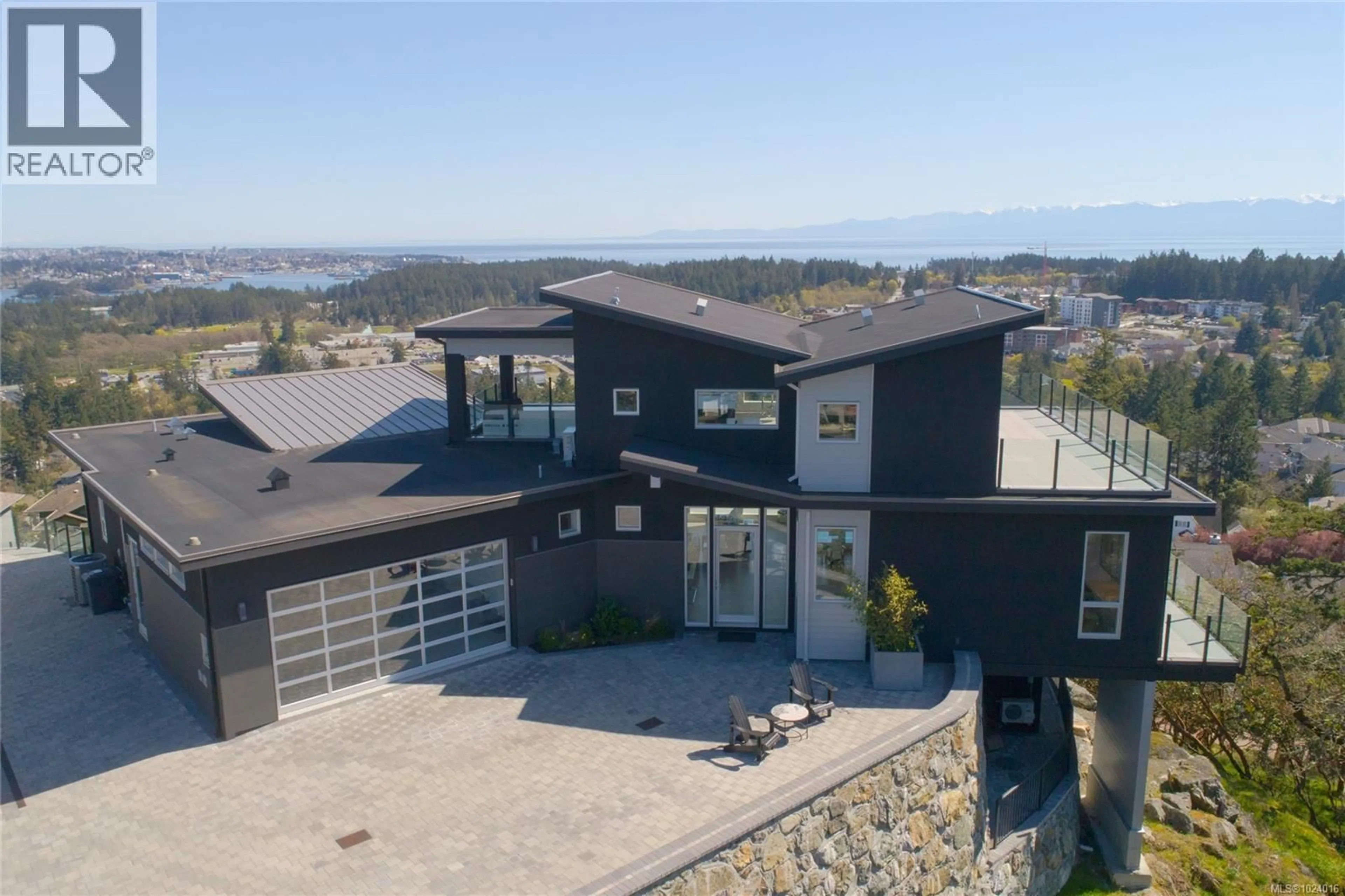 A pic from outside/outdoor area/front of a property/back of a property/a pic from drone, mountain view for 2713 GOLDSTONE HEIGHTS, Langford British Columbia V9B0A9