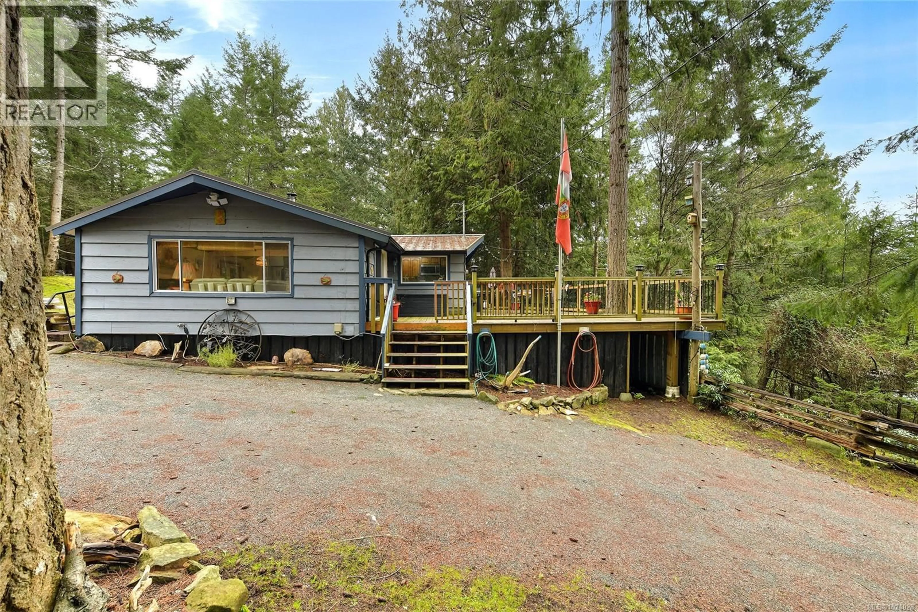 A pic from outside/outdoor area/front of a property/back of a property/a pic from drone, forest/trees view for 493 ABBOTT ROAD, Mayne Island British Columbia V0N2J1