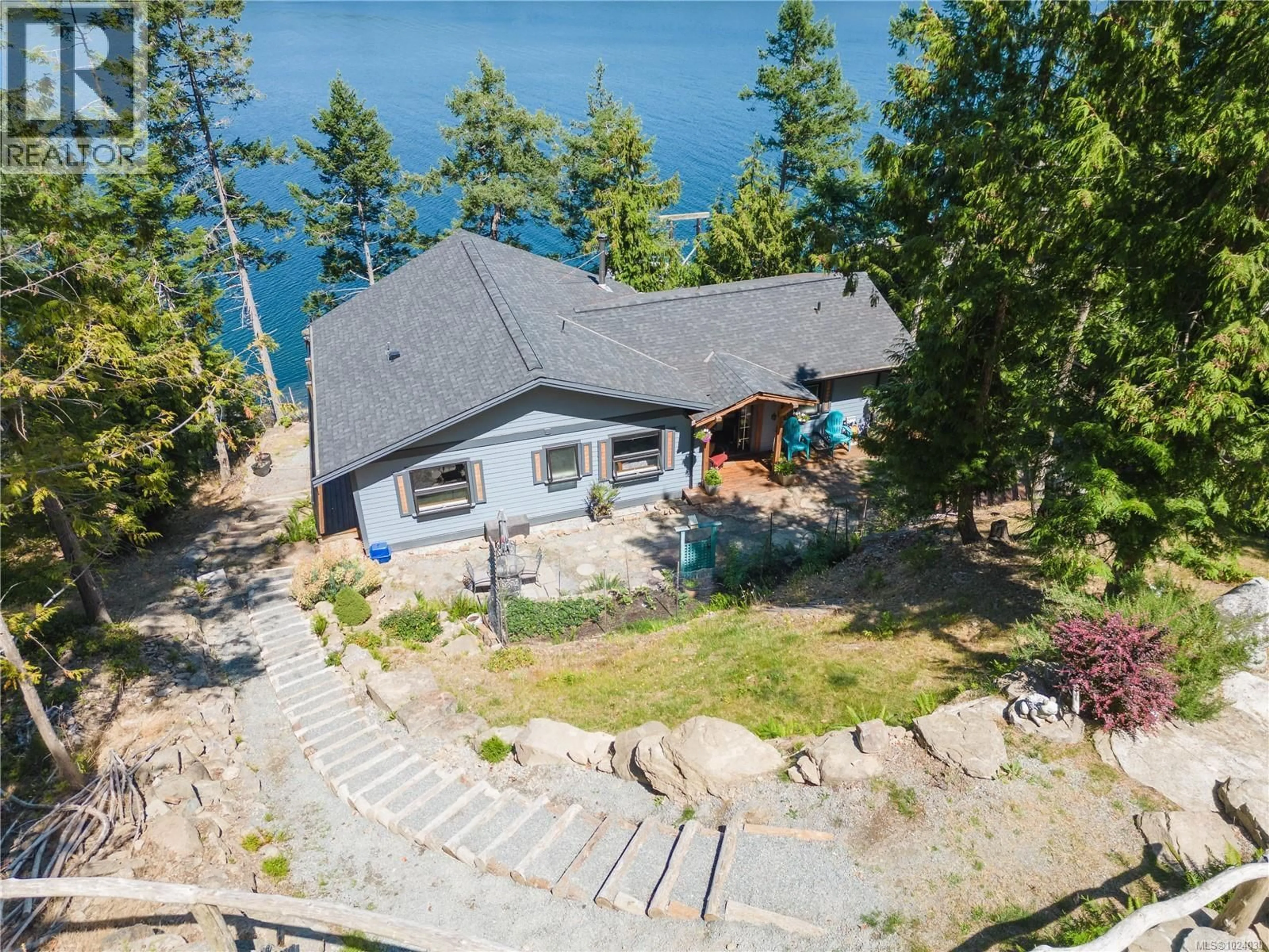 A pic from outside/outdoor area/front of a property/back of a property/a pic from drone, water/lake/river/ocean view for 659 WILKS ROAD, Mayne Island British Columbia V0N2J1