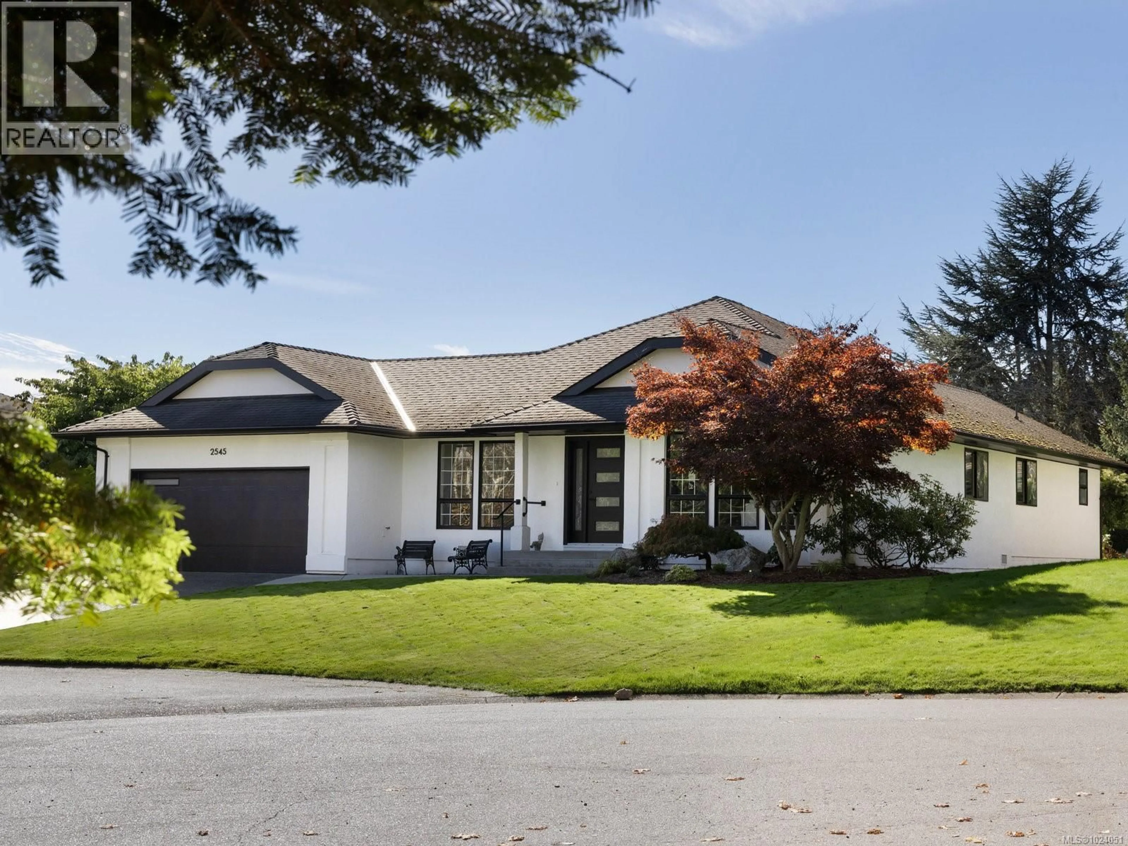 Home with vinyl exterior material, street for 2545 NEWMAN ROAD, Central Saanich British Columbia V8M1V1