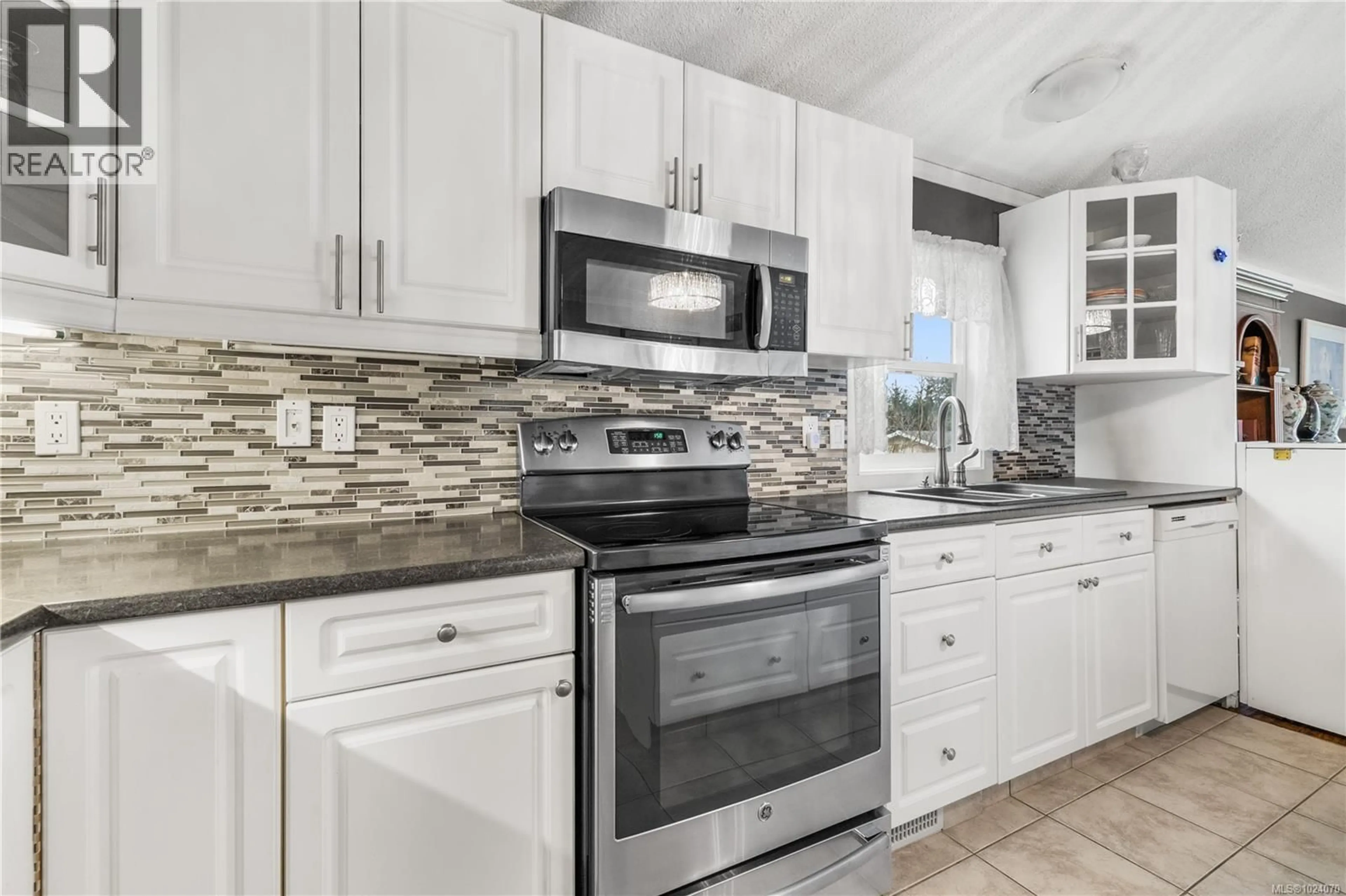 Open concept kitchen, ceramic/tile floor for 58 - 1901 RYAN ROAD EAST, Comox British Columbia V9M4E1