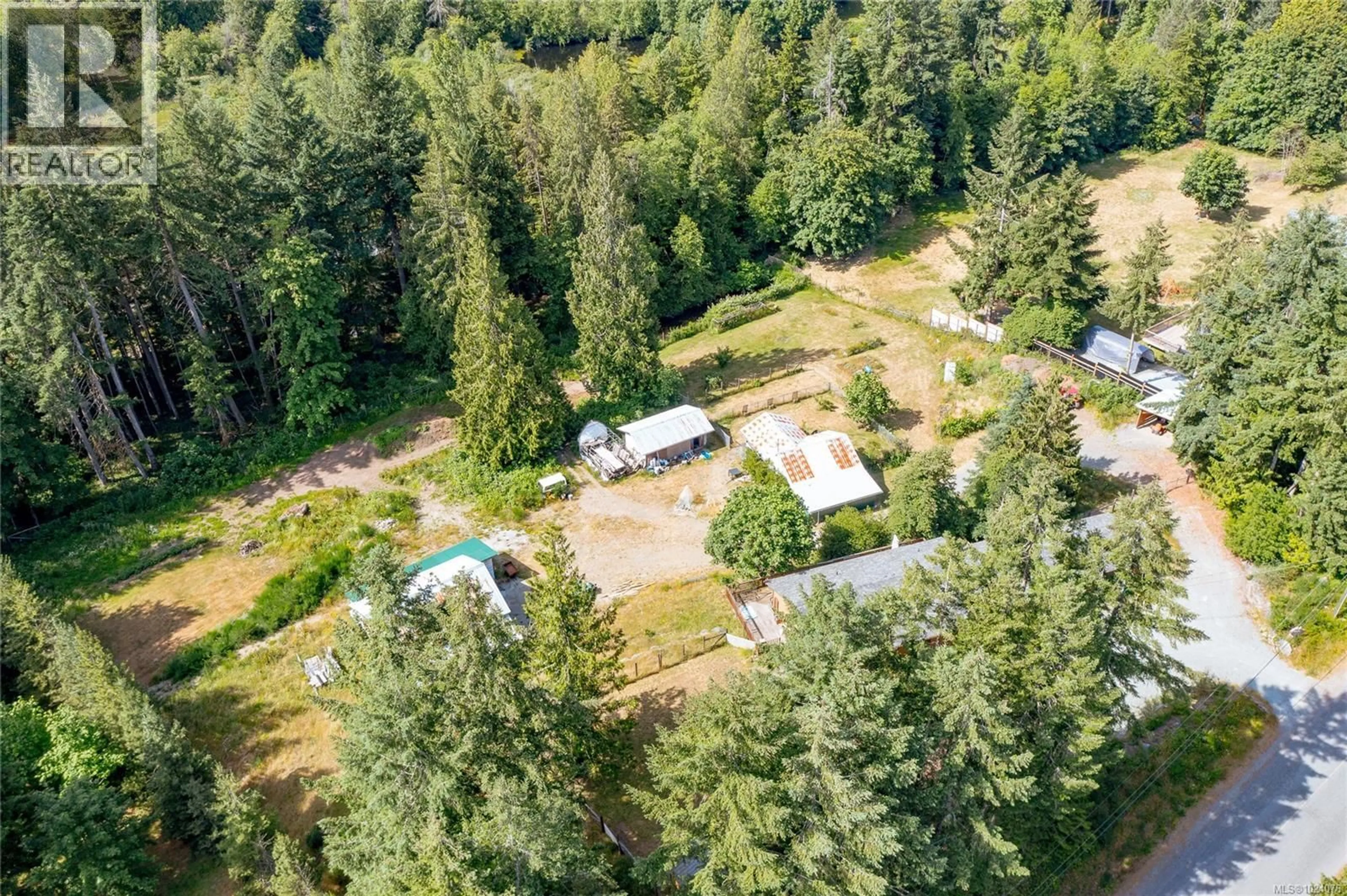 A pic from outside/outdoor area/front of a property/back of a property/a pic from drone, forest/trees view for 5036 CULVERTON ROAD, Duncan British Columbia V9L6H4