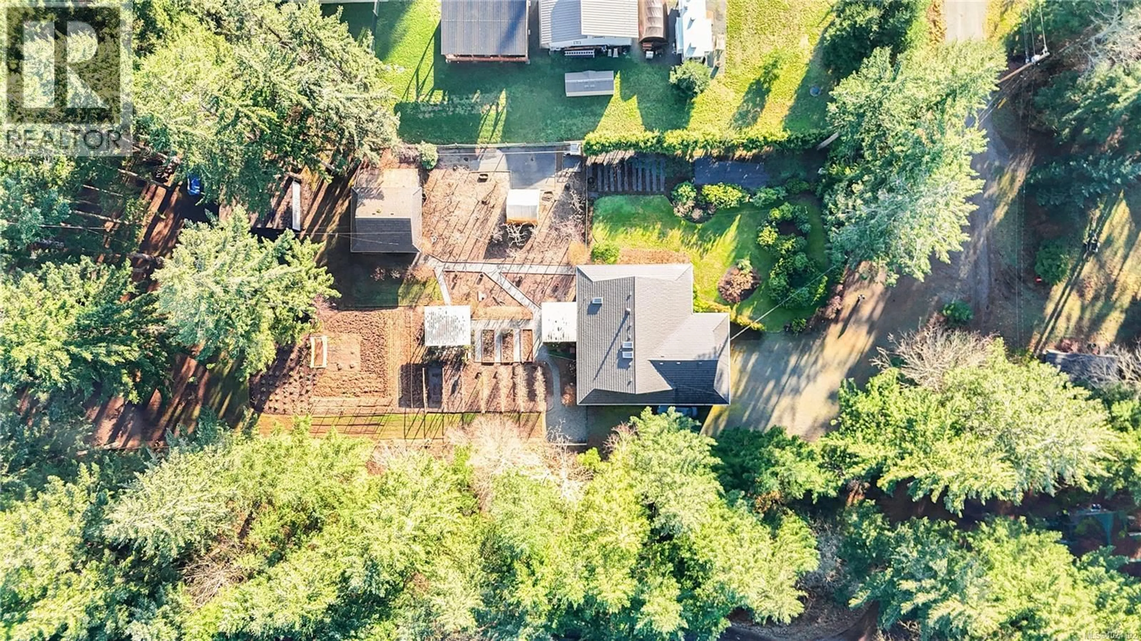 A pic from outside/outdoor area/front of a property/back of a property/a pic from drone, unknown for 4496 GARY LANE, Campbell River British Columbia V9H1B8