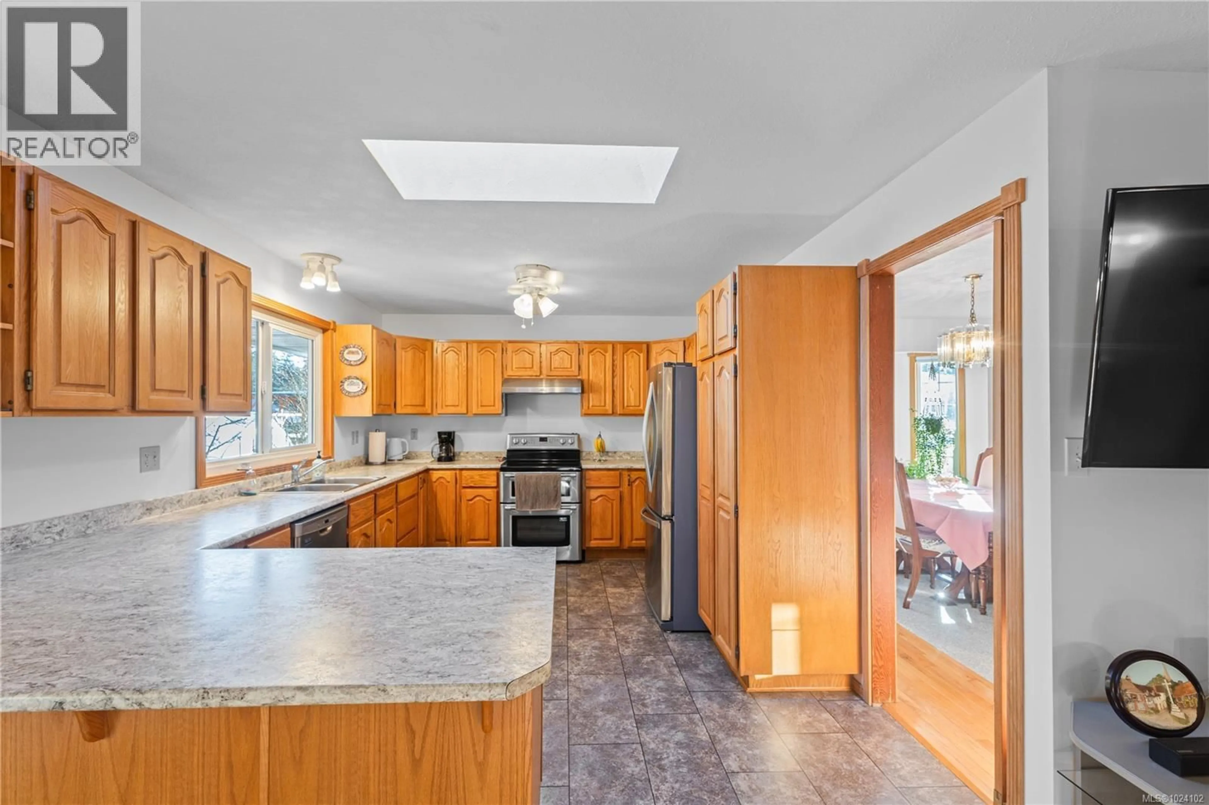 Open concept kitchen, ceramic/tile floor for 4496 GARY LANE, Campbell River British Columbia V9H1B8