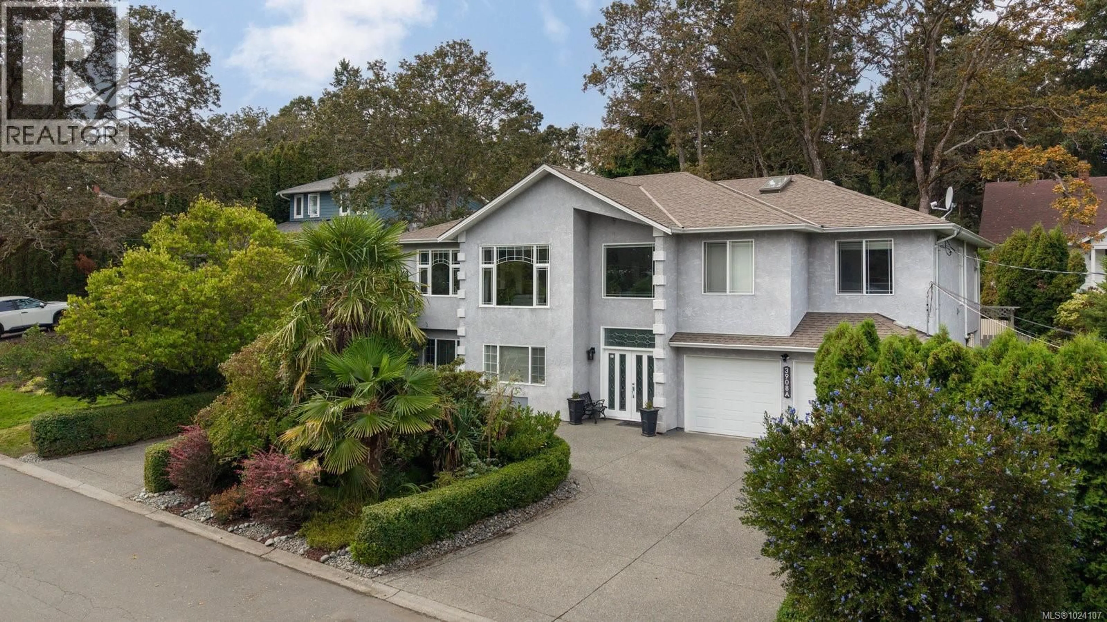 A pic from outside/outdoor area/front of a property/back of a property/a pic from drone, street for 3908A ASCOT DRIVE, Saanich British Columbia V8P3S1