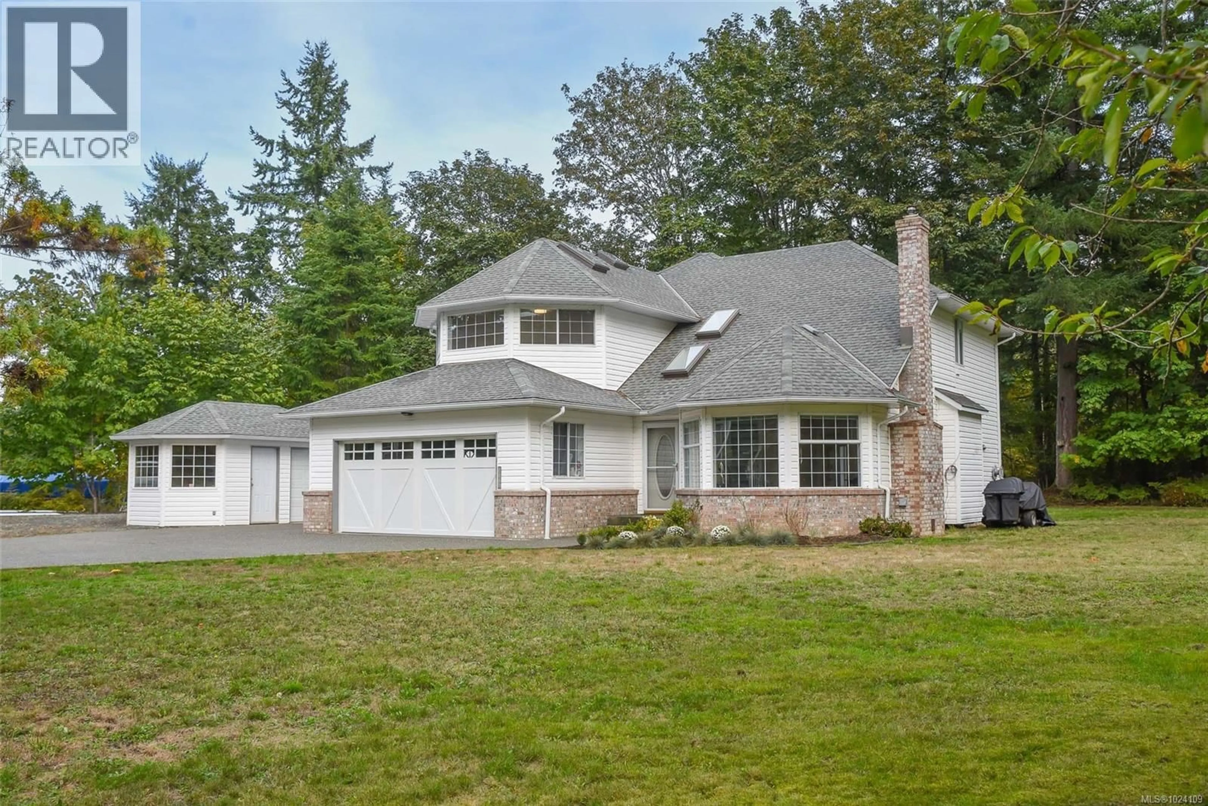 Home with vinyl exterior material, street for 8868 ERICKSON PLACE, Black Creek British Columbia V9J1H9