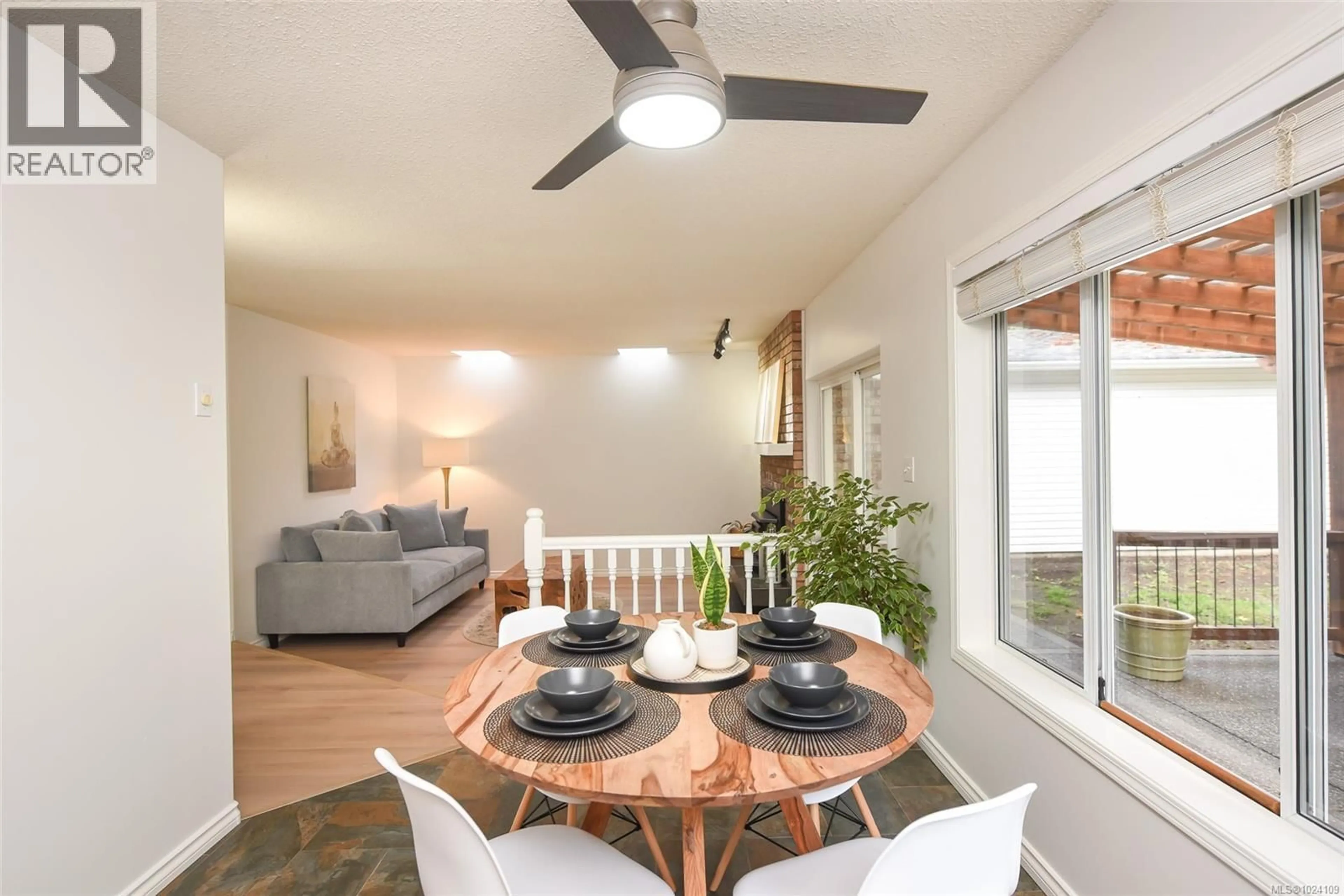 Dining room, wood/laminate floor for 8868 ERICKSON PLACE, Black Creek British Columbia V9J1H9
