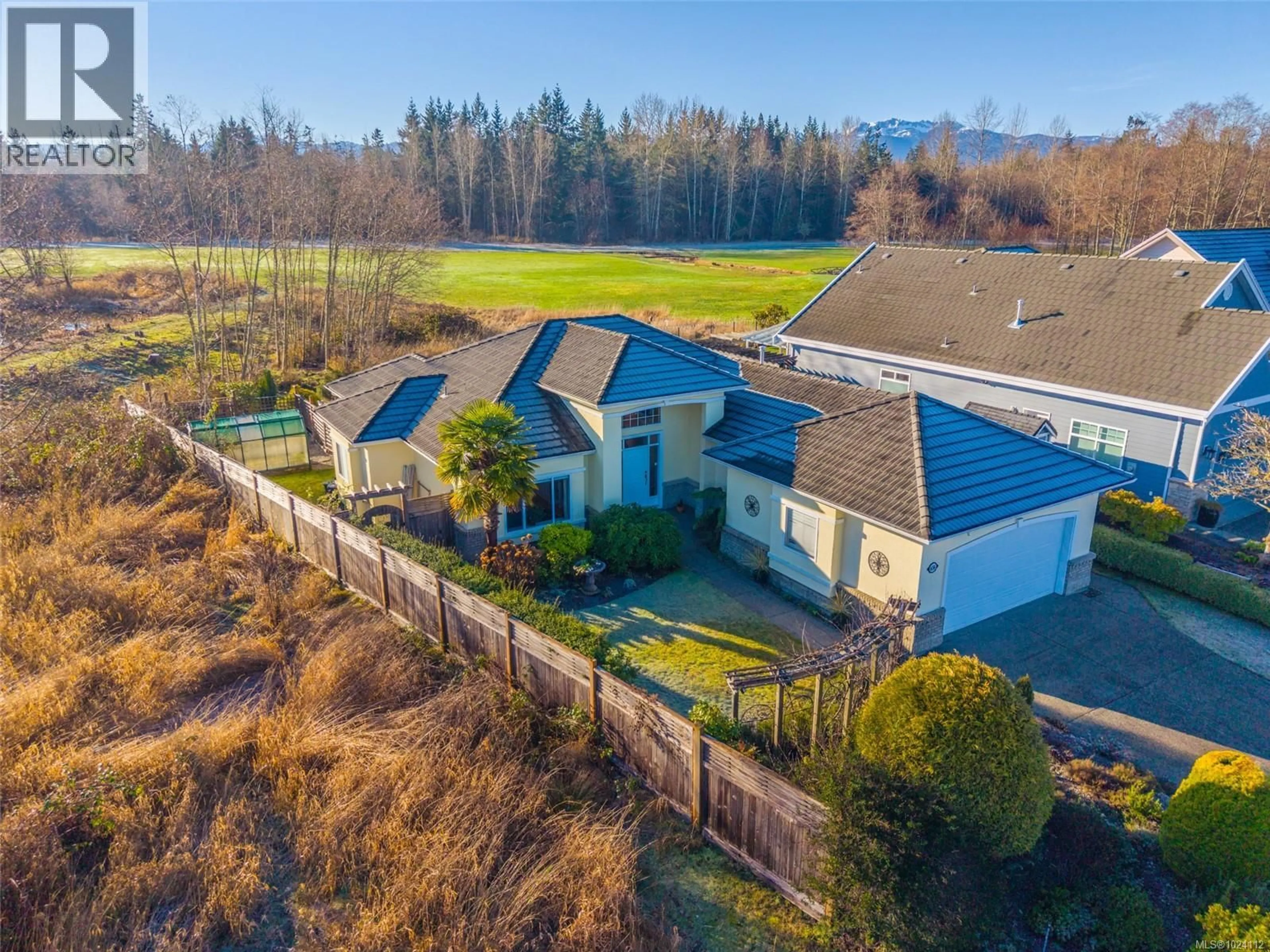 A pic from outside/outdoor area/front of a property/back of a property/a pic from drone, mountain view for 656 MORNINGSTAR DRIVE, Parksville British Columbia V9P2W3