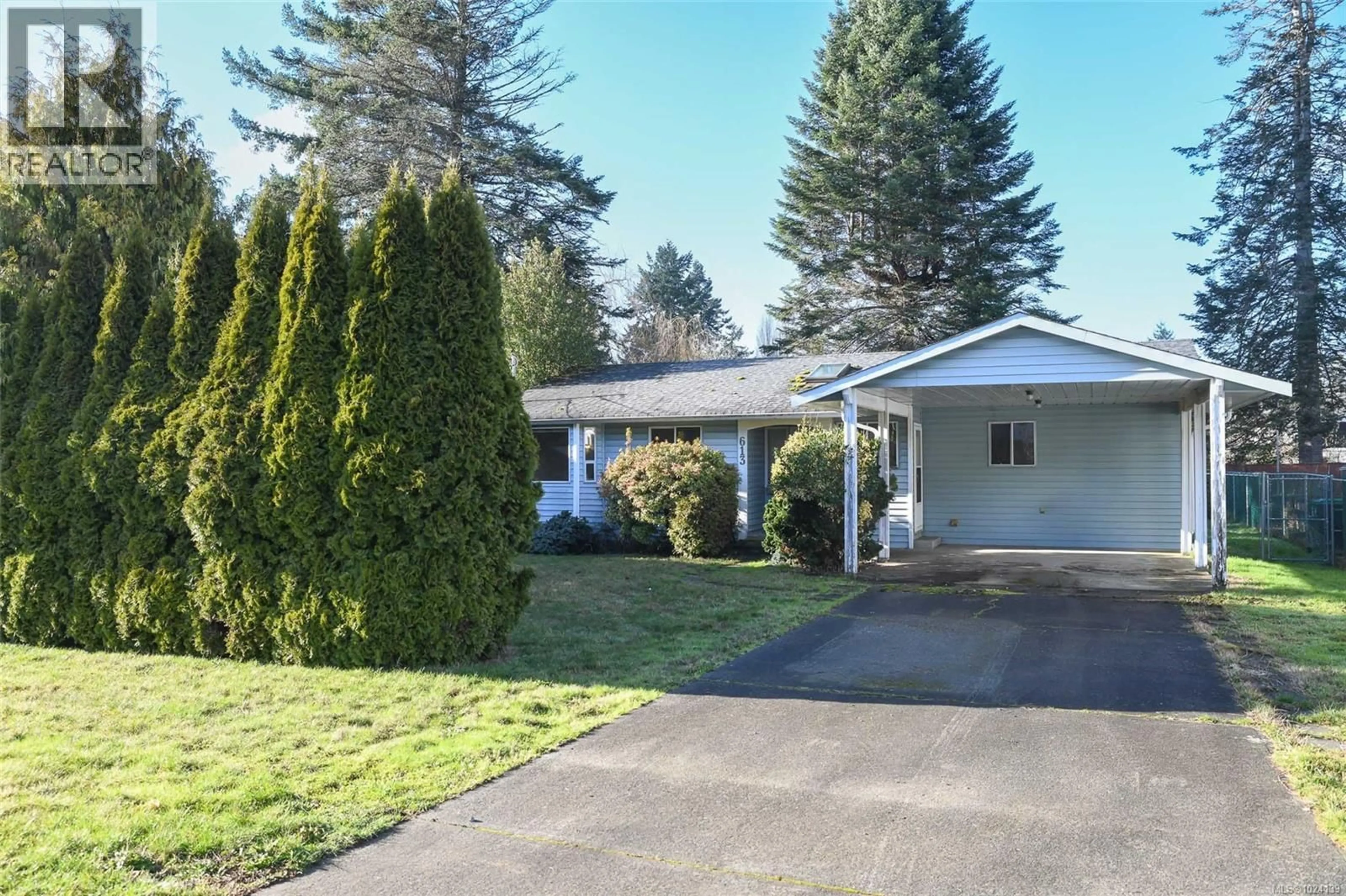 Home with vinyl exterior material, street for 613 PRITCHARD ROAD, Comox British Columbia V9M3J1